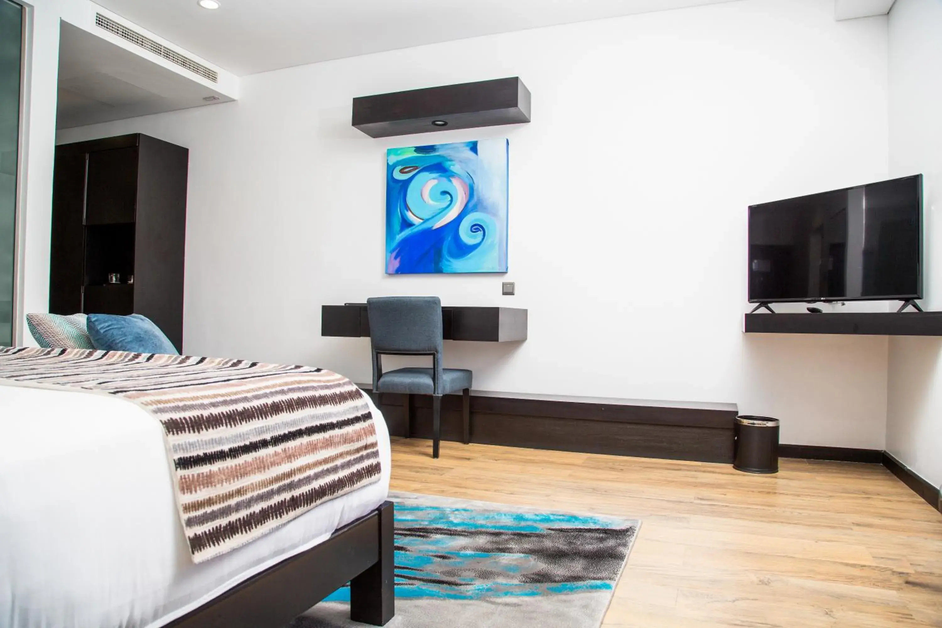 Communal lounge/ TV room, Bed in Amaryllis Hotel Blantyre Communal lounge/ TV room, Bed in Amaryllis Hotel Blantyre