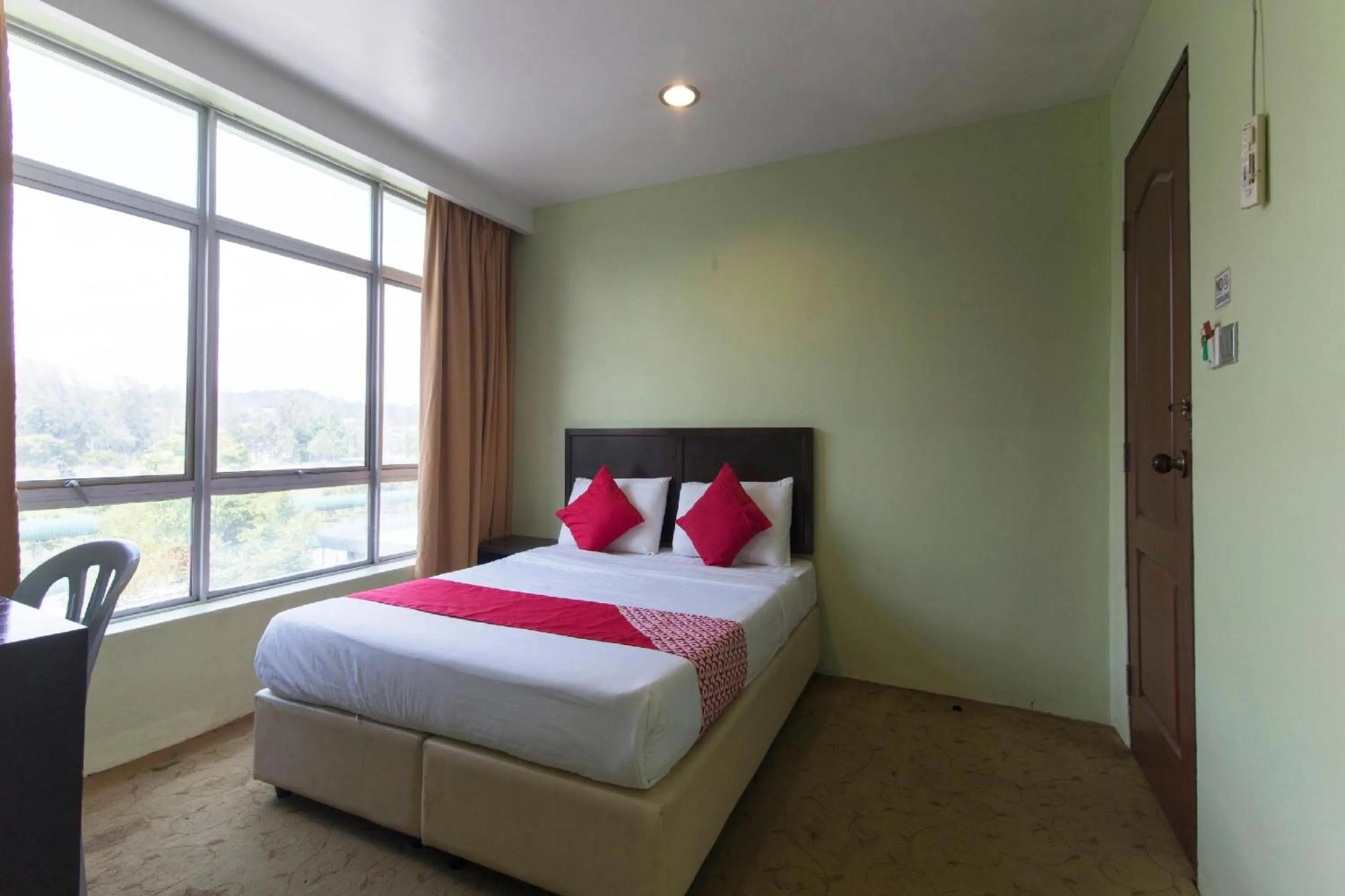 View (from property/room), Bed in Amani Hotel