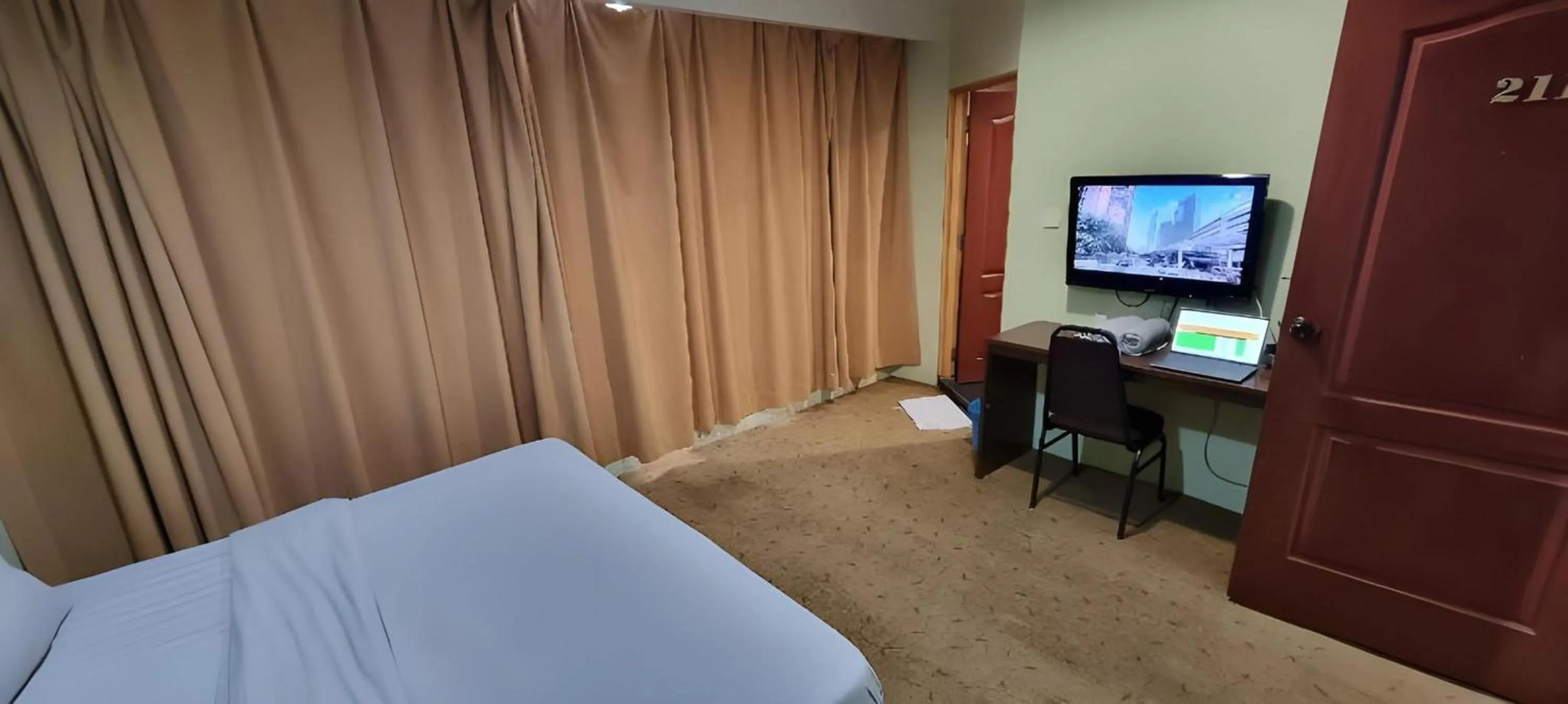 TV and multimedia, Bed in Amani Hotel