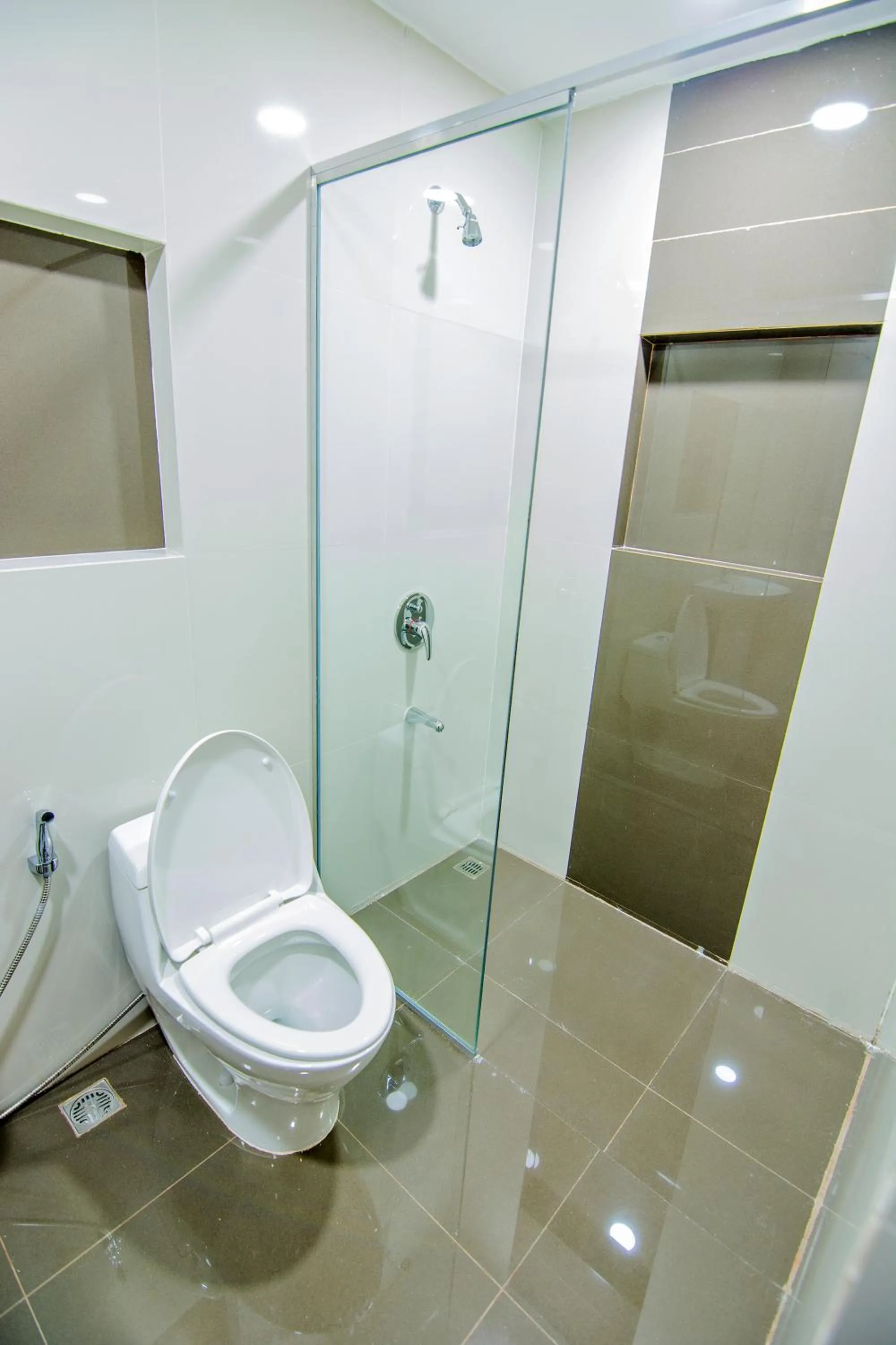 Toilet in Quest Villa