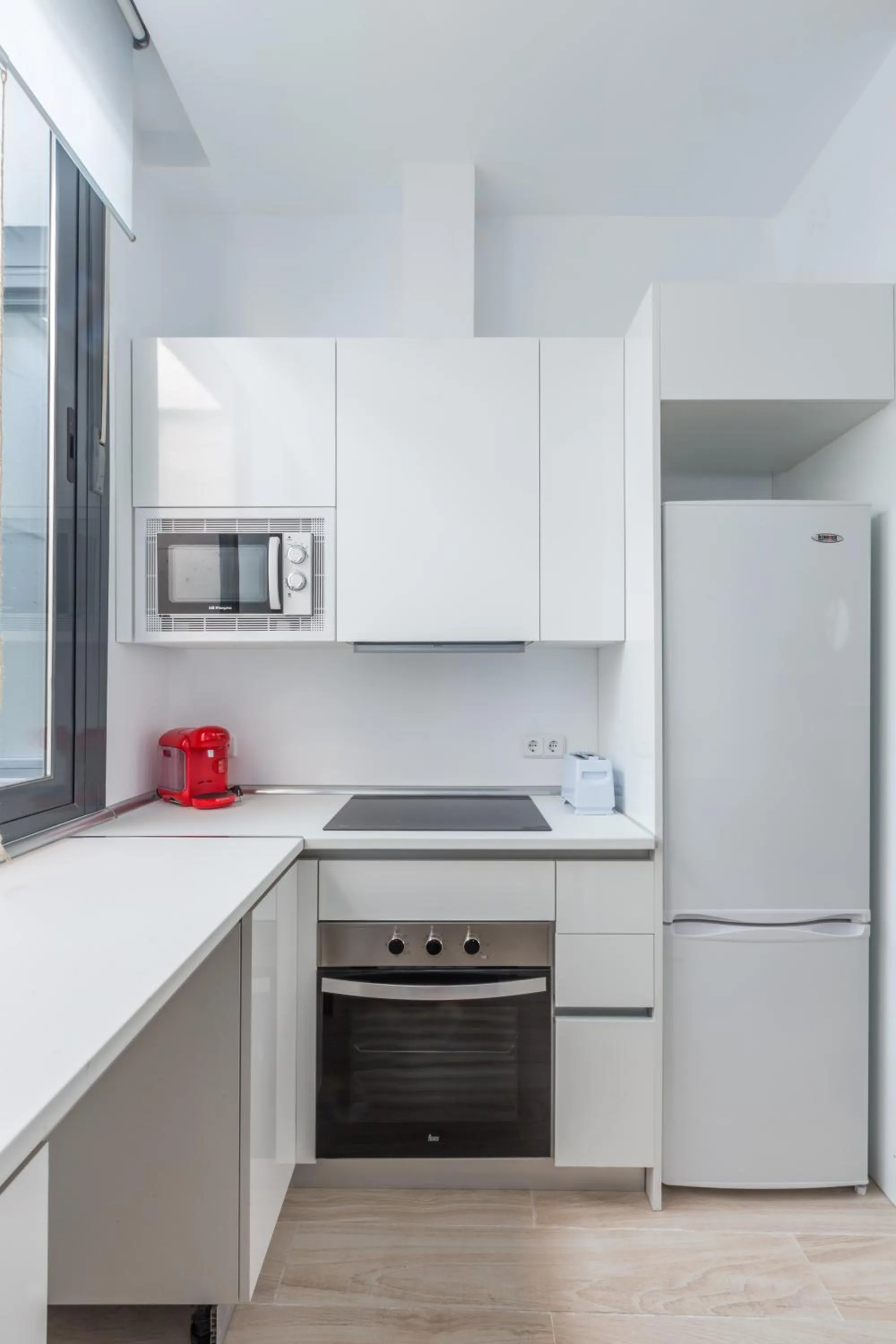 Kitchen or kitchenette in Horoko Apartments by gaiarooms