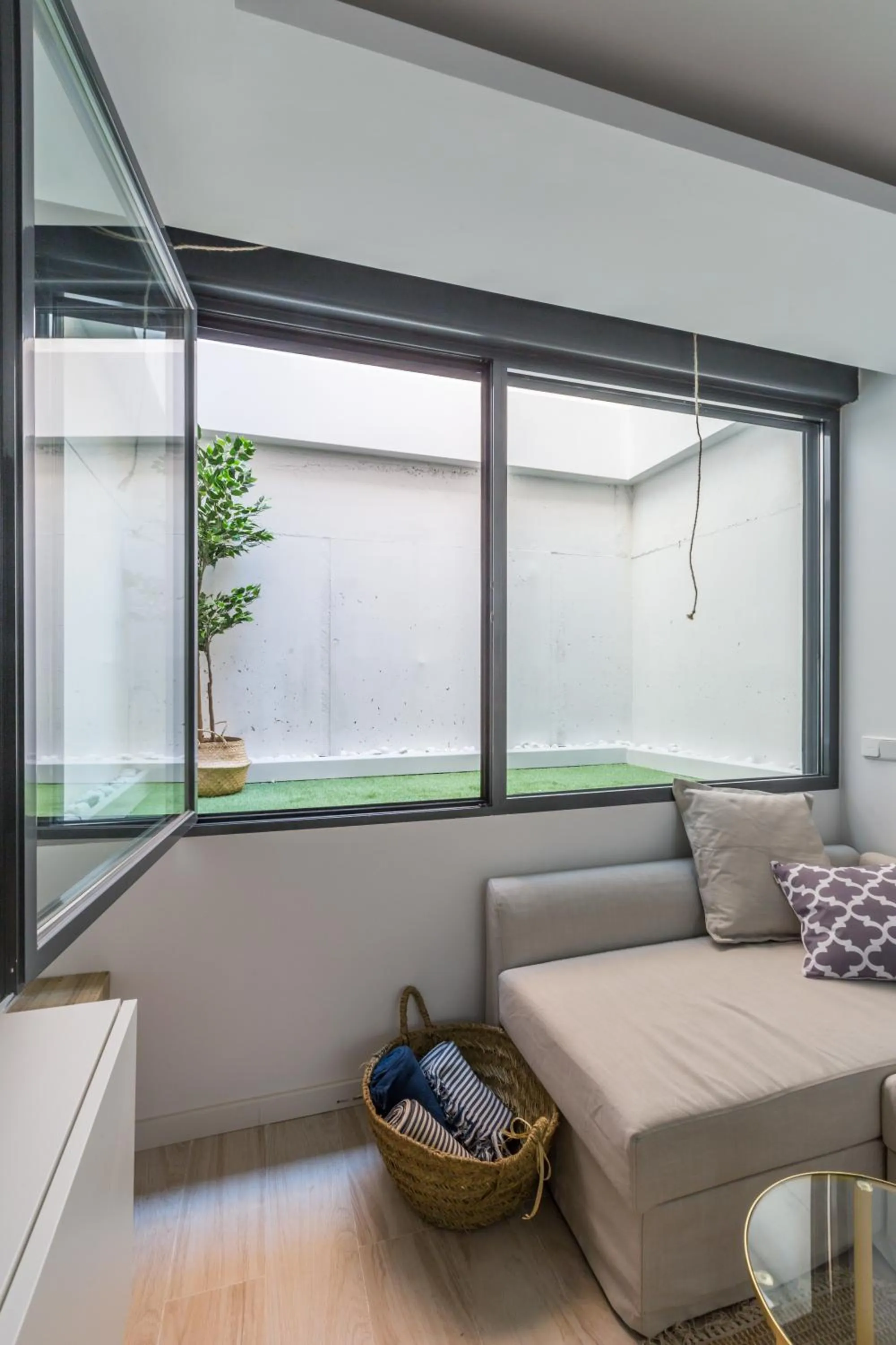 Living room in Horoko Apartments by gaiarooms