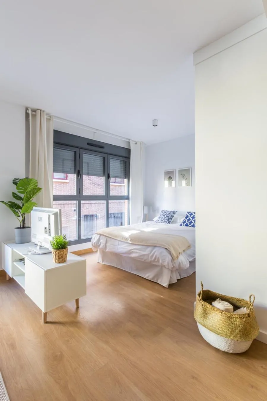 Bed in Horoko Apartments by gaiarooms