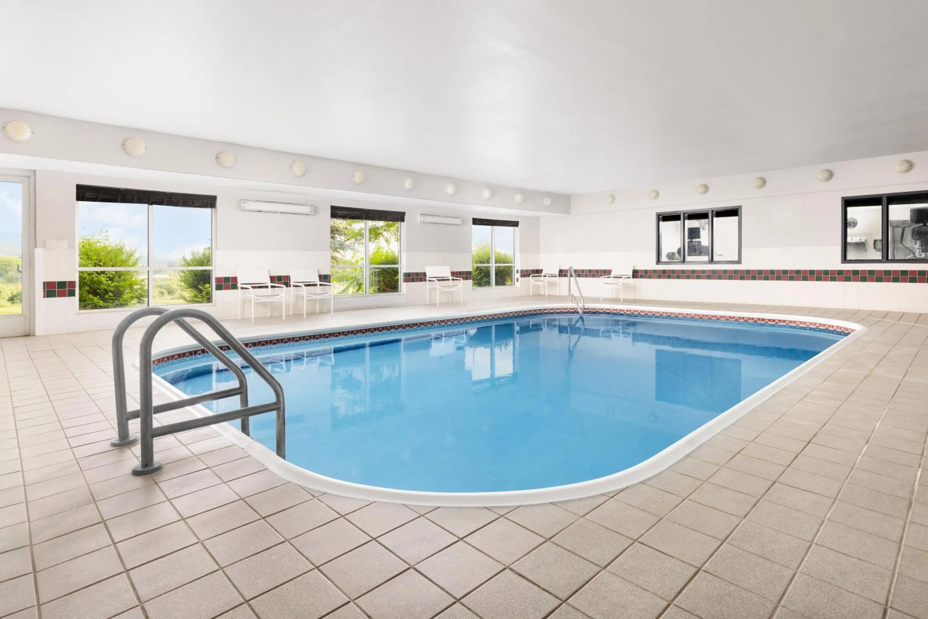 Pool view in Country Inn & Suites by Radisson, Big Flats (Elmira), NY
