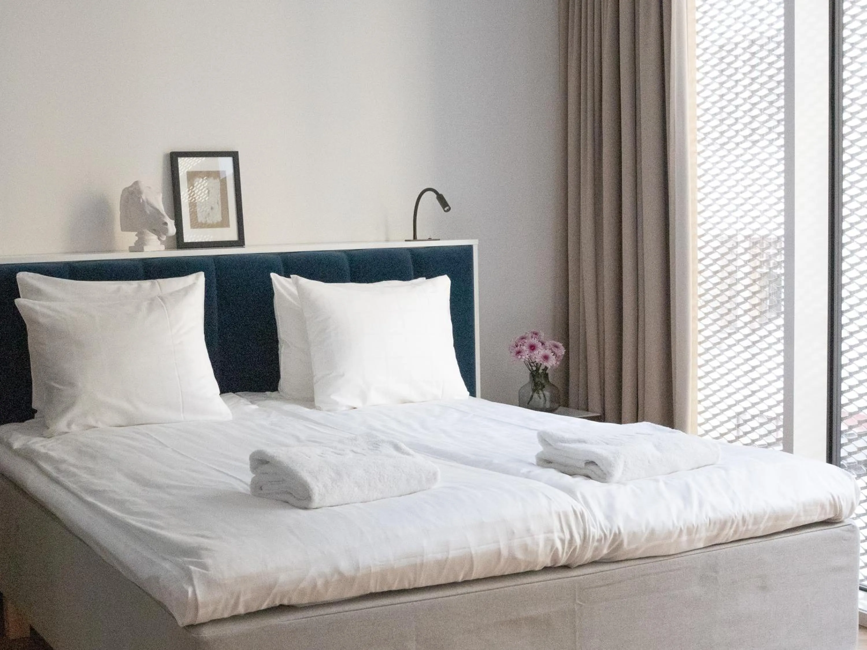 Bed in Bob W Helsinki Ullanlinna