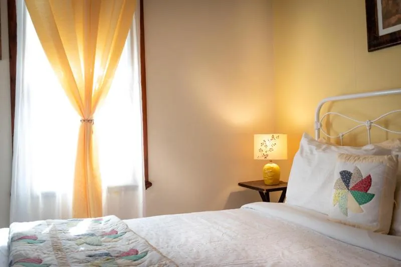 Bed in Complexe d'hébergement la Maison touristique Dugas