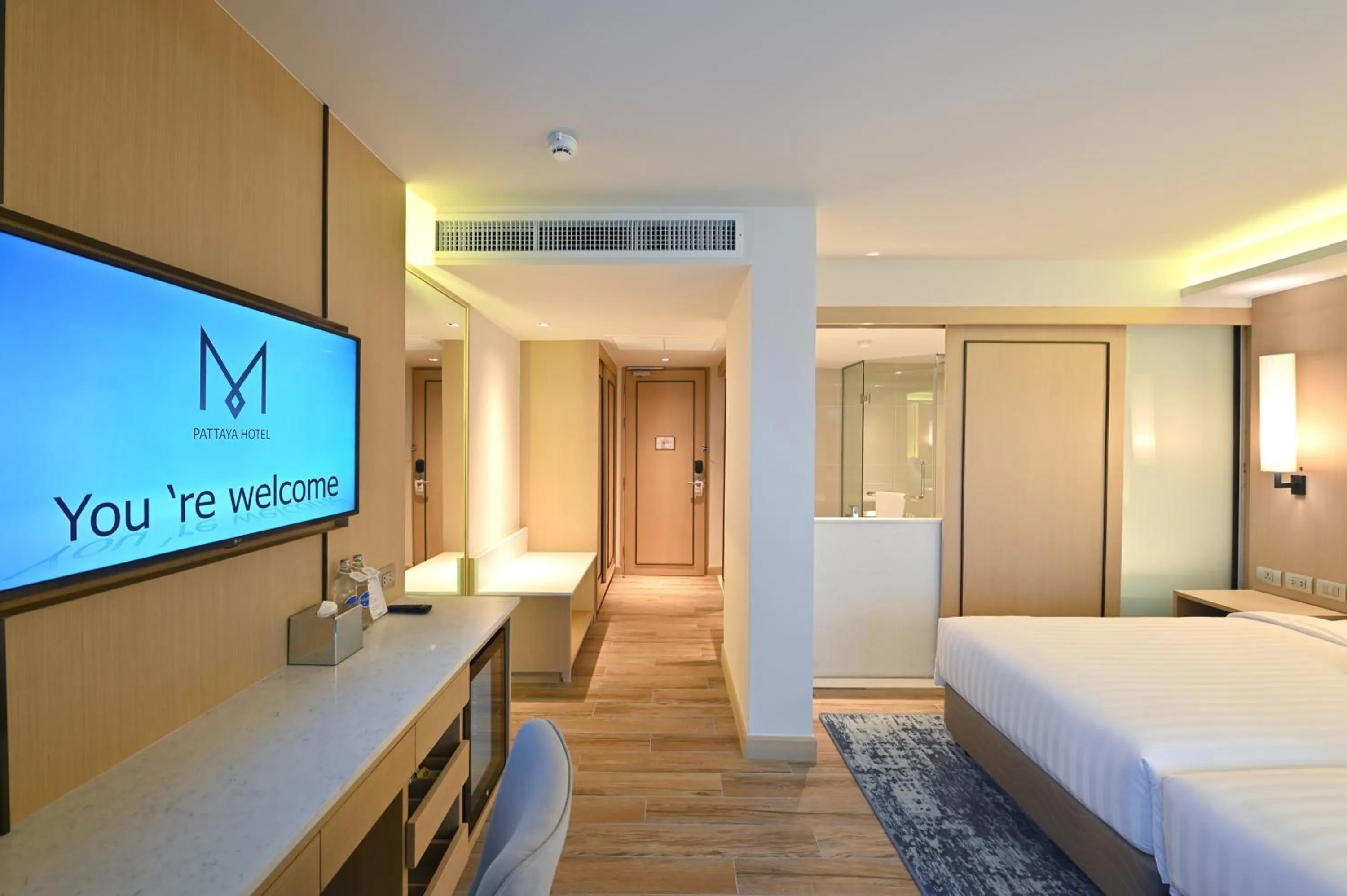 Bedroom, Bed in M Pattaya Hotel - SHA Extra Plus