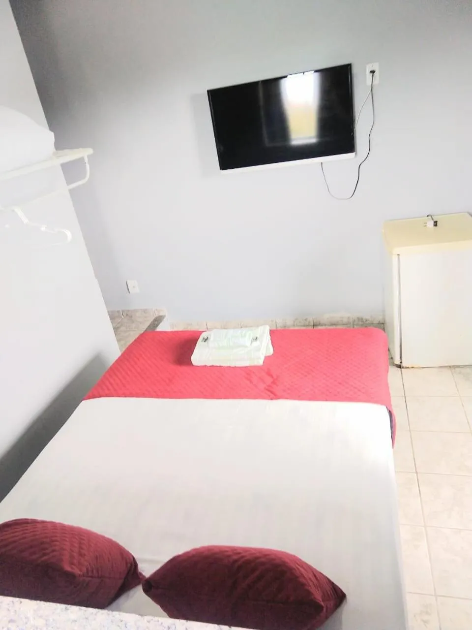 Bed in Pousada Balbino