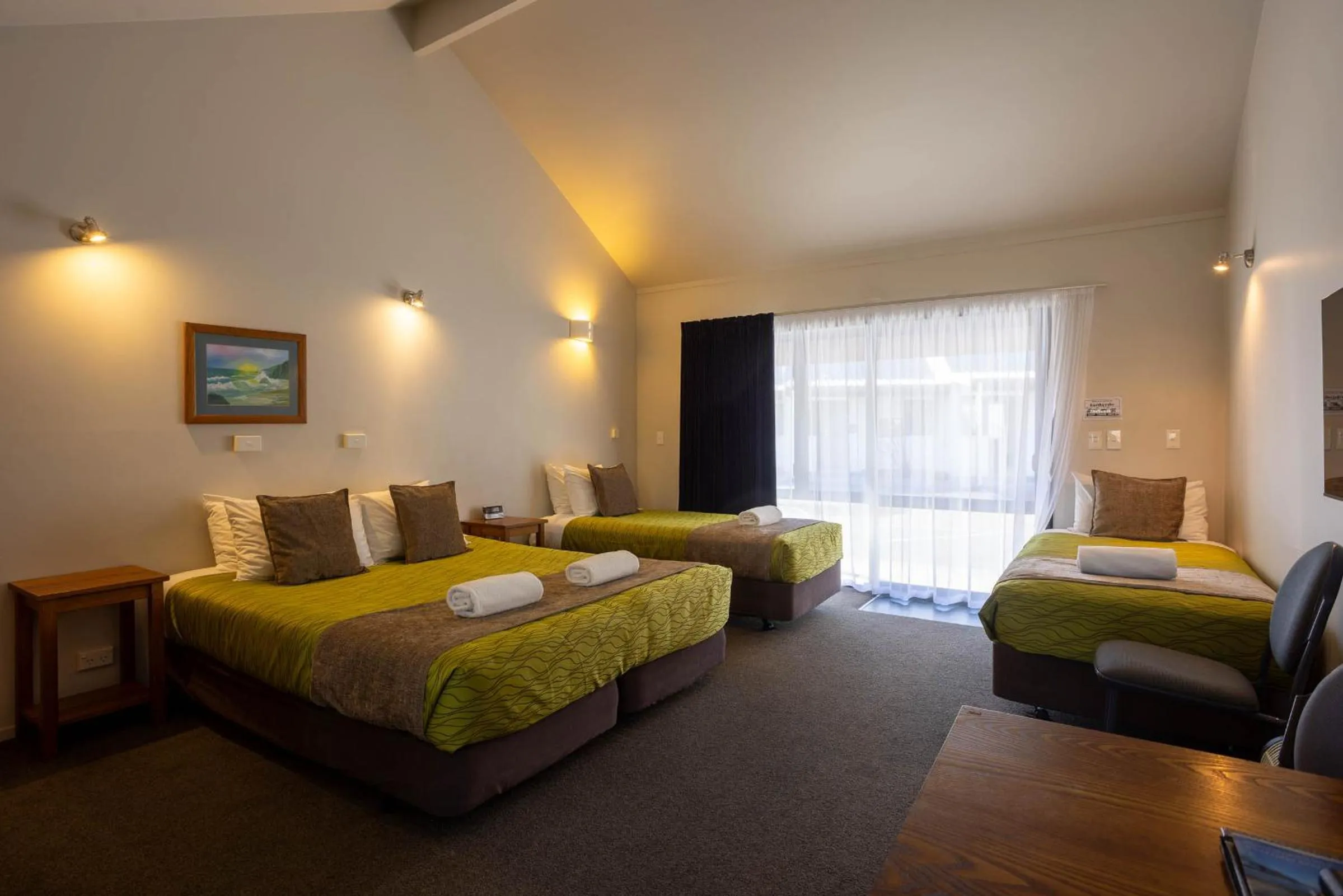 Bed in Alpine Glacier Motel