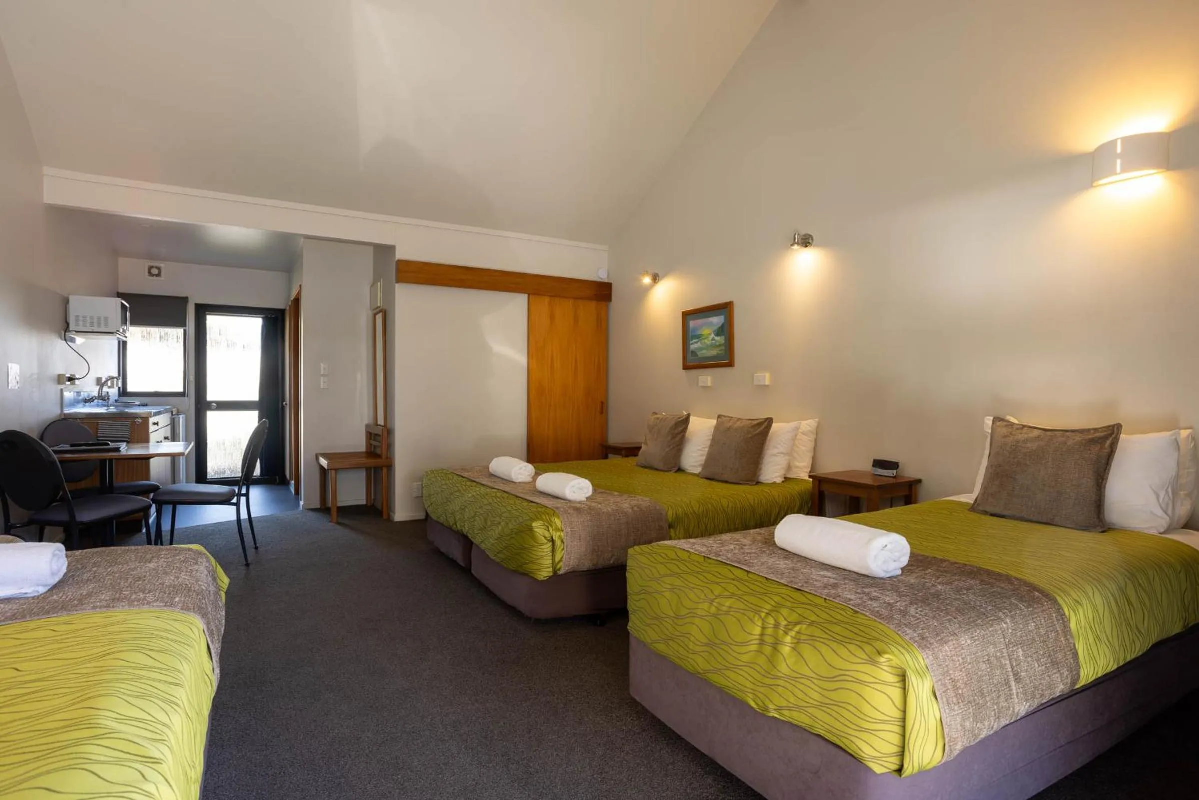 Bed in Alpine Glacier Motel