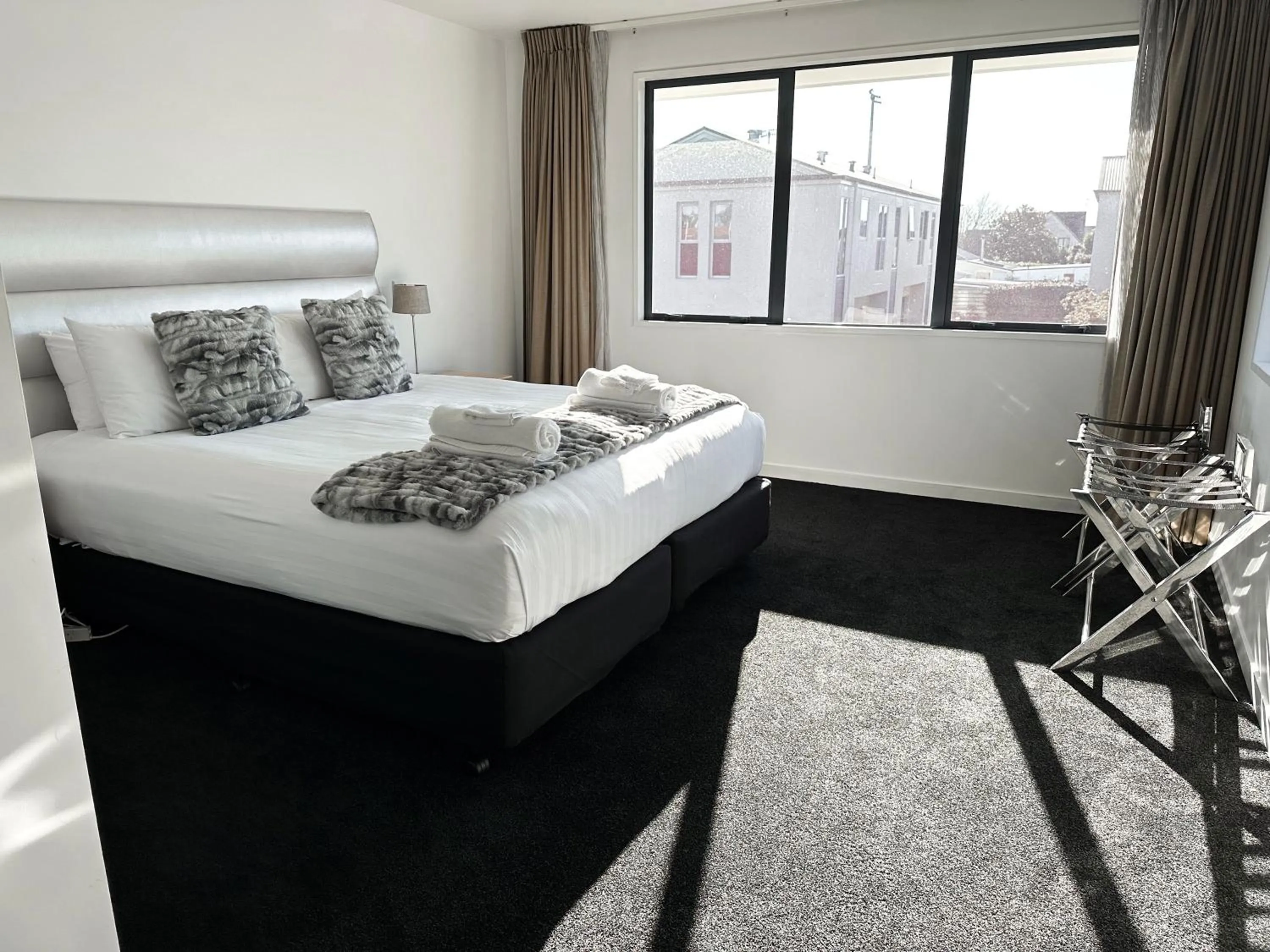 Bedroom, Bed in Delorenzo Studio Apartments