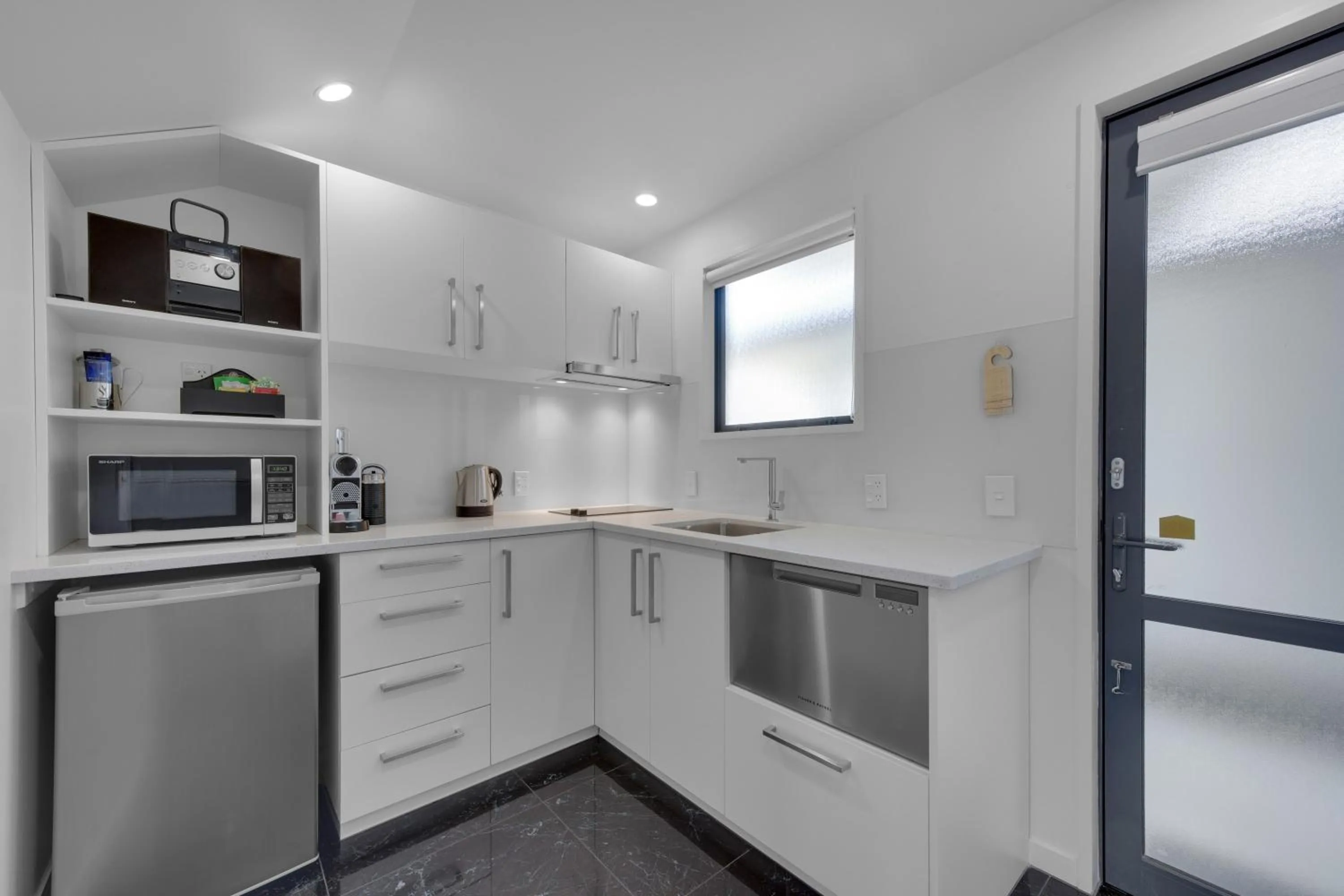 Kitchen or kitchenette in Delorenzo Studio Apartments