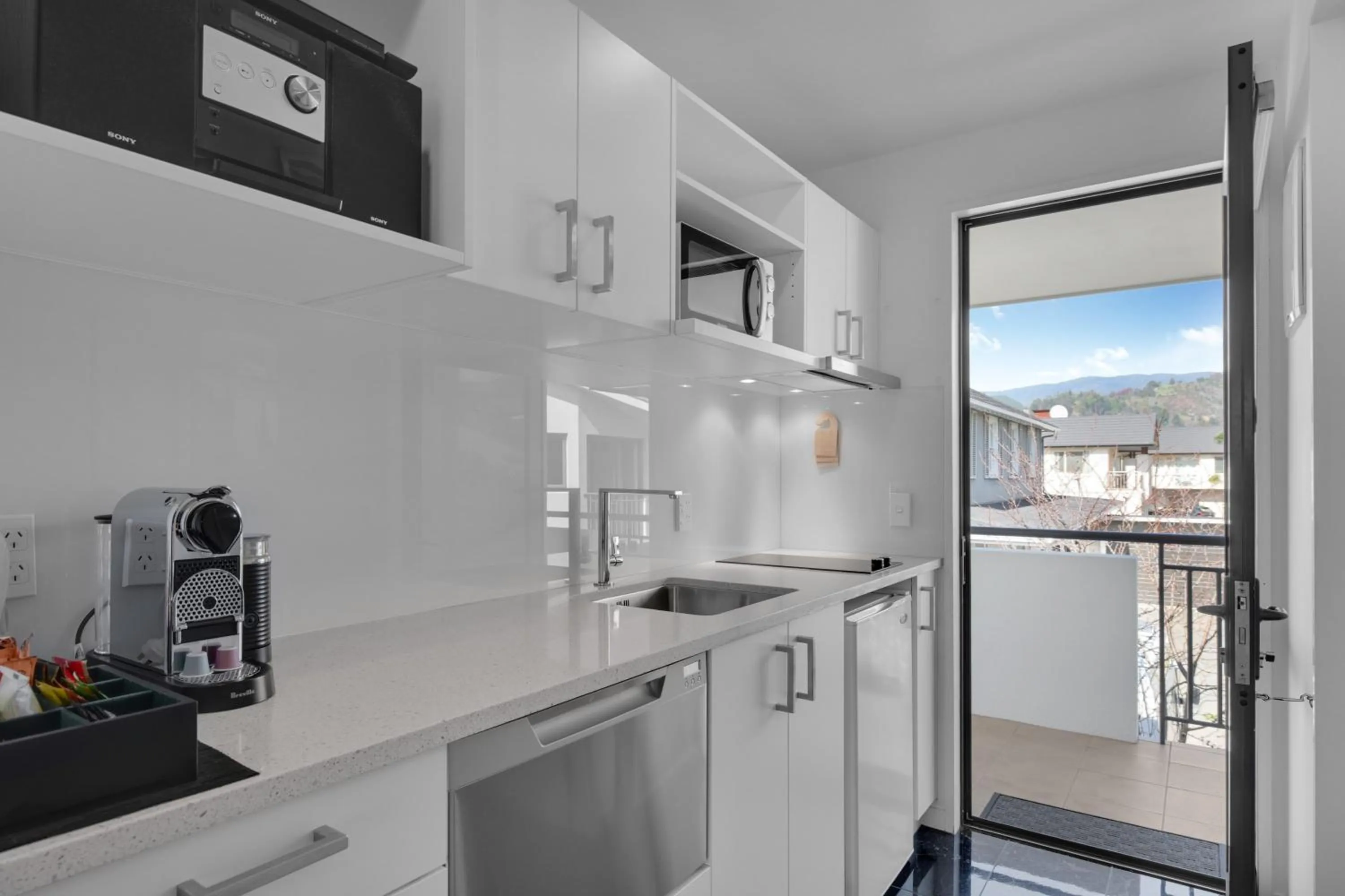 Poolside Studio Spa Shower & Bath in Delorenzo Studio Apartments