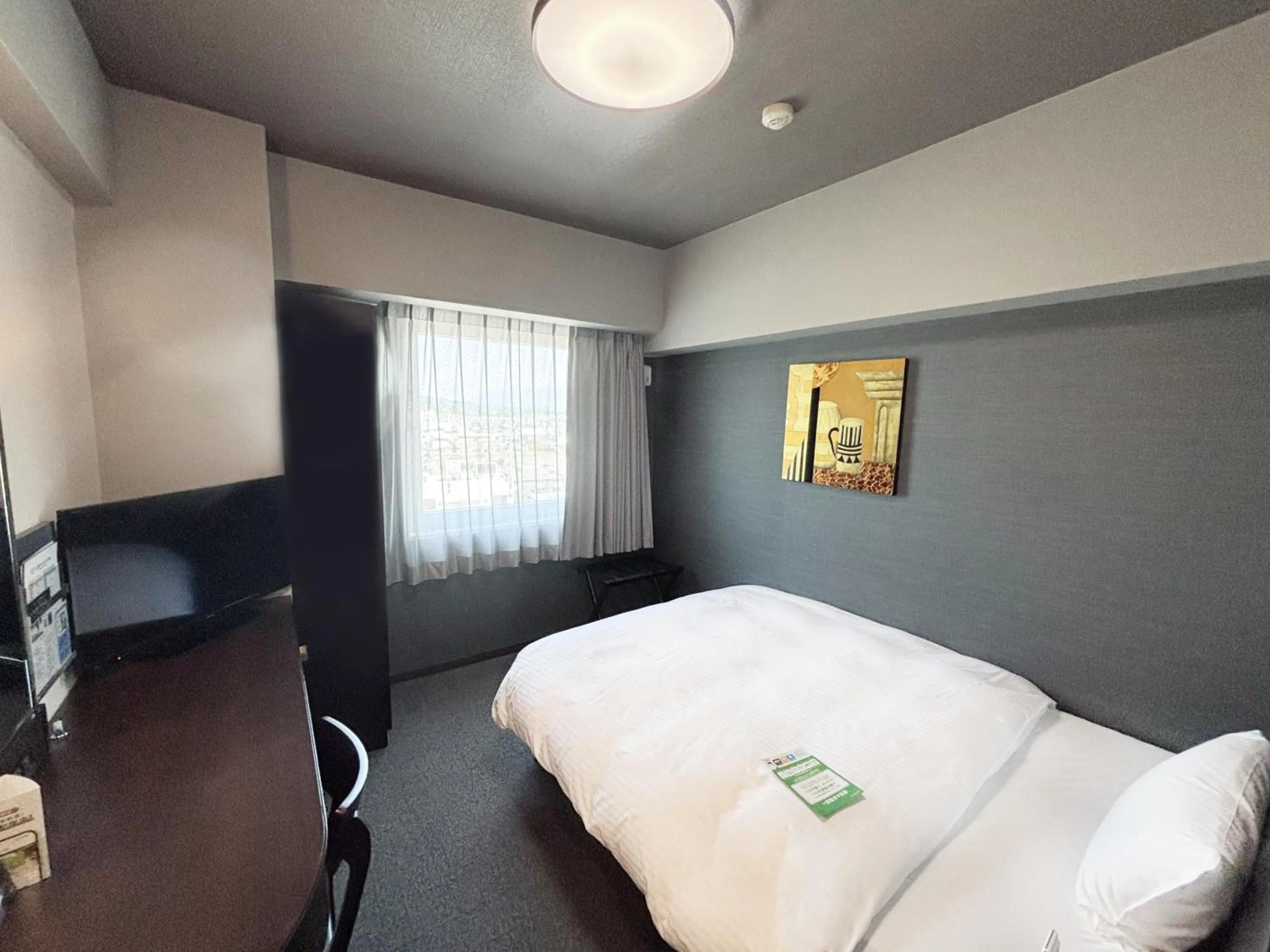 Photo of the whole room, Bed in Hotel Route-Inn Iyo-Saijo