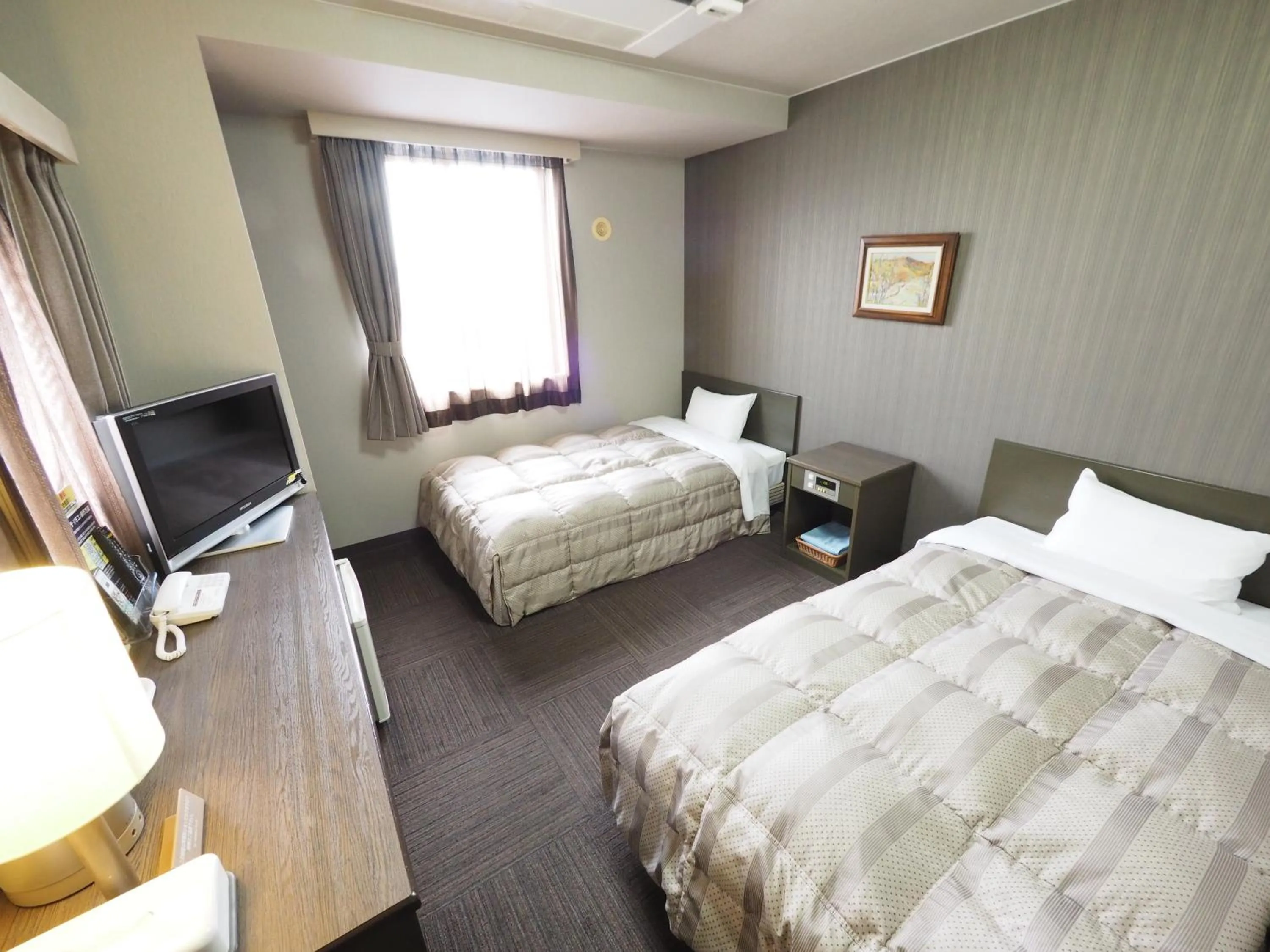 Photo of the whole room, Bed in Hotel Route-Inn Court Matsumoto Inter