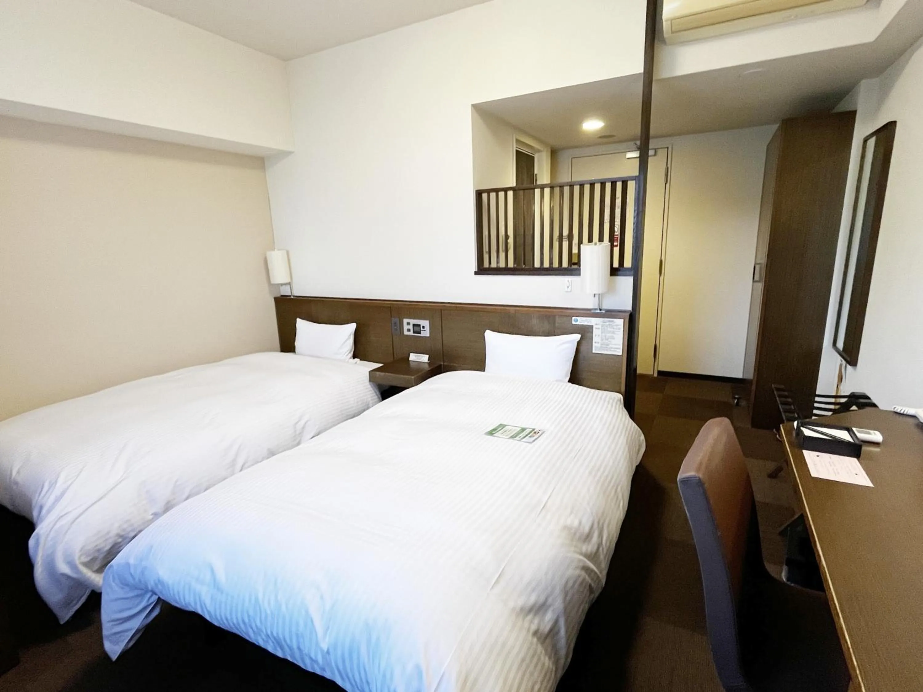 Photo of the whole room, Bed in Hotel Route-Inn Hikone