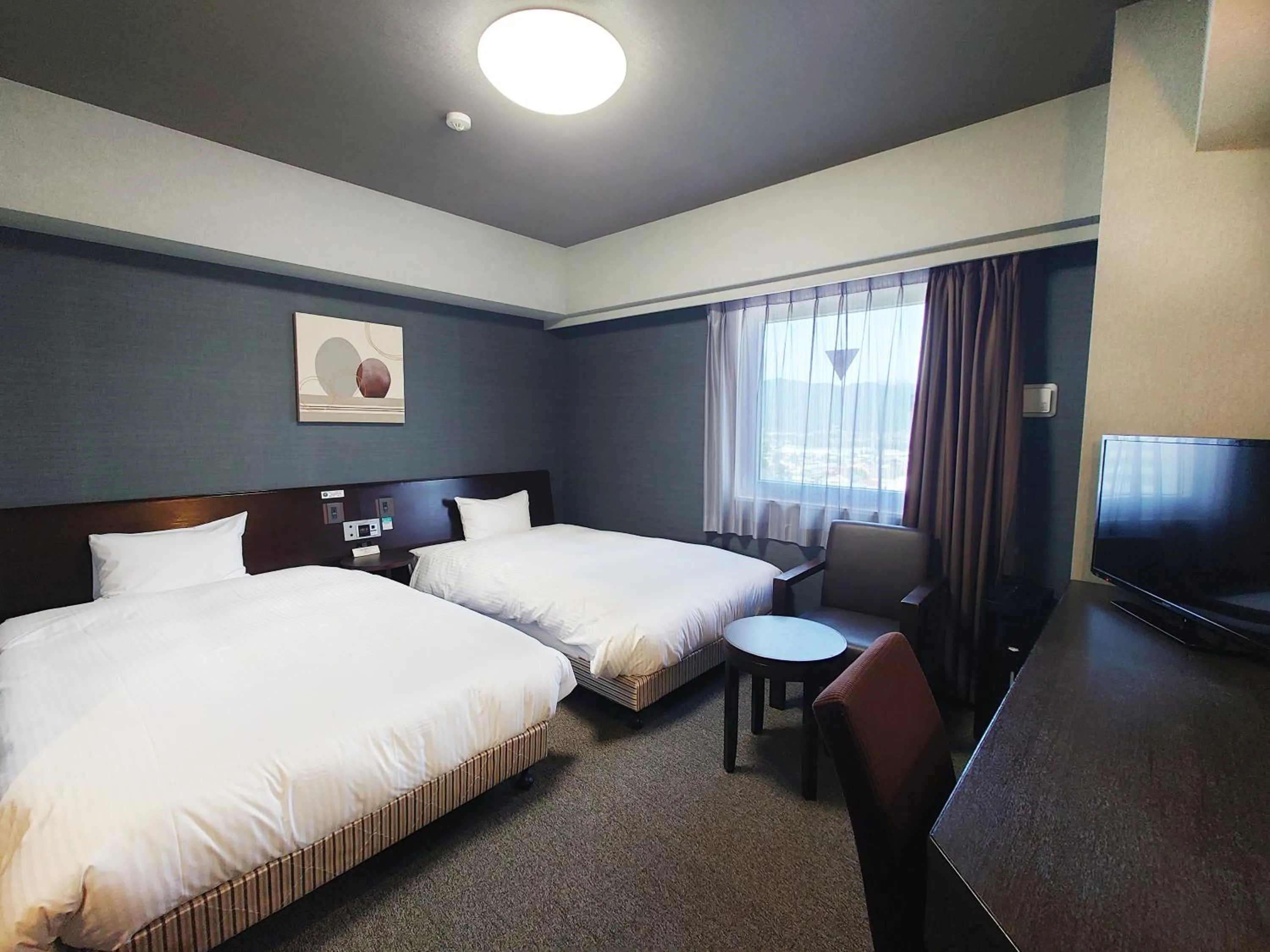 Photo of the whole room, Bed in Hotel Route-Inn Komagane Inter