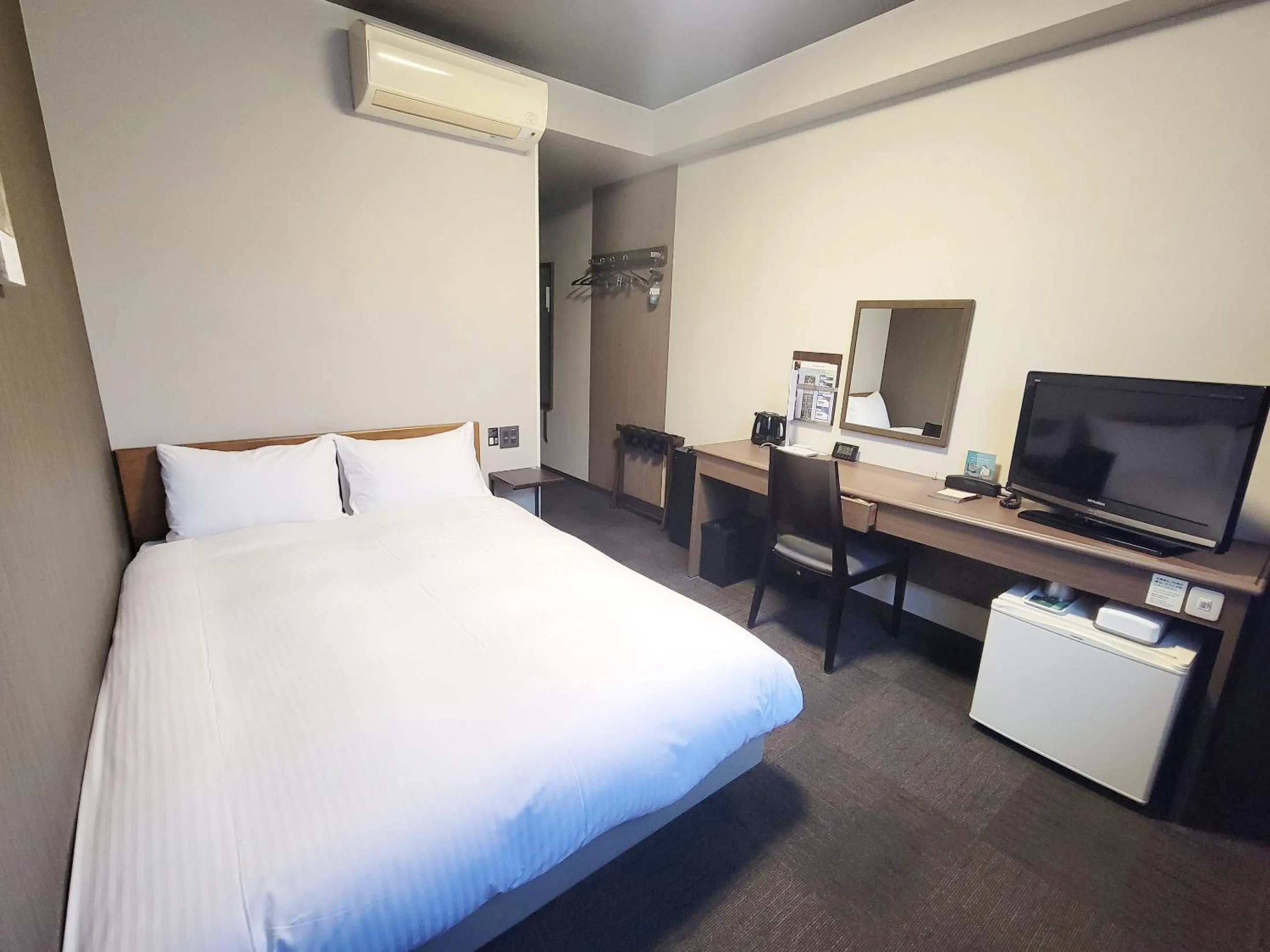Photo of the whole room, Bed in Hotel Route-Inn Komoro