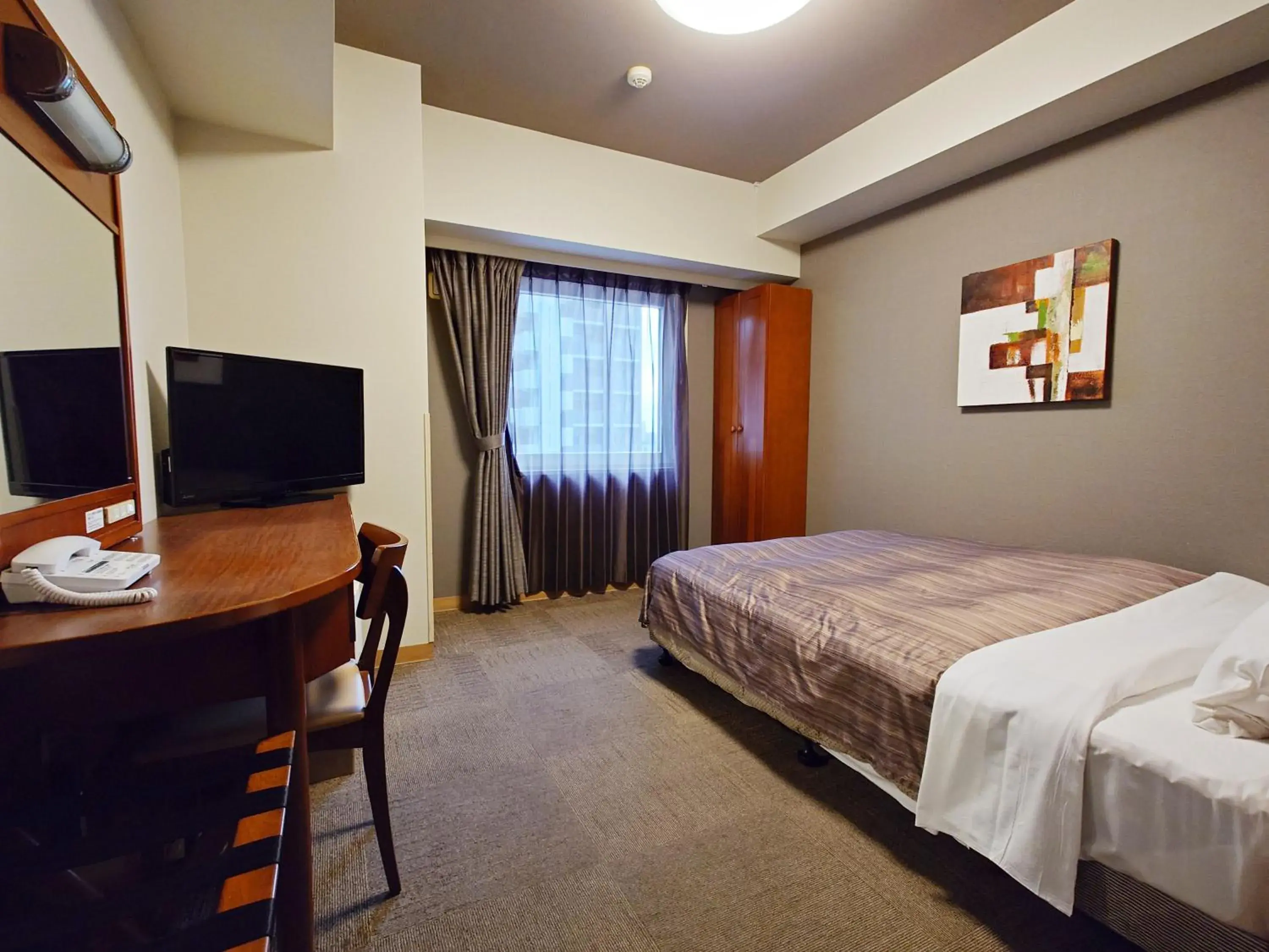 Photo of the whole room, Bed in Hotel Route-Inn Koga Ekimae Photo of the whole room, Bed in Hotel Route-Inn Koga Ekimae