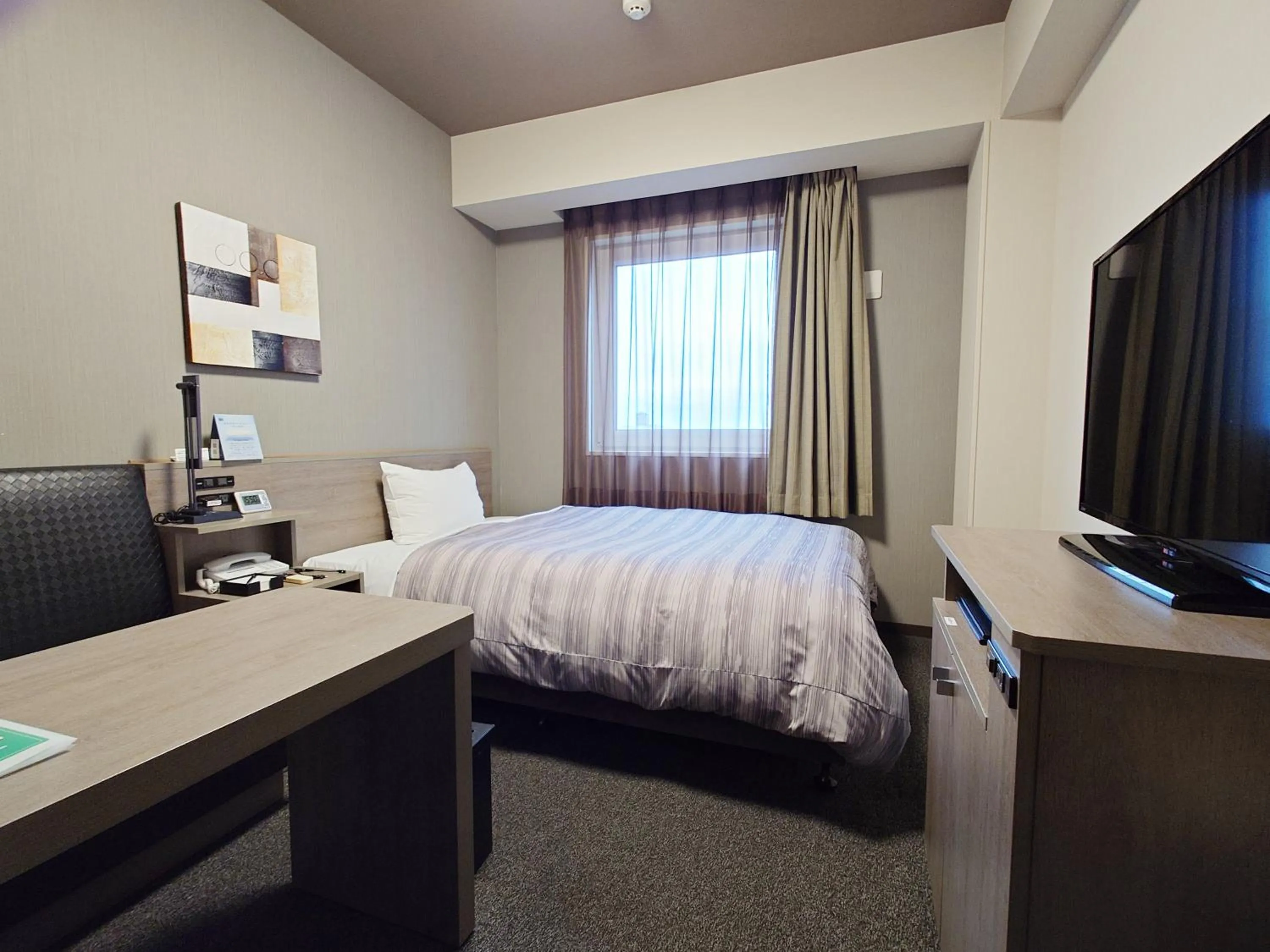 Photo of the whole room, Bed in Hotel Route-Inn Koga Ekimae