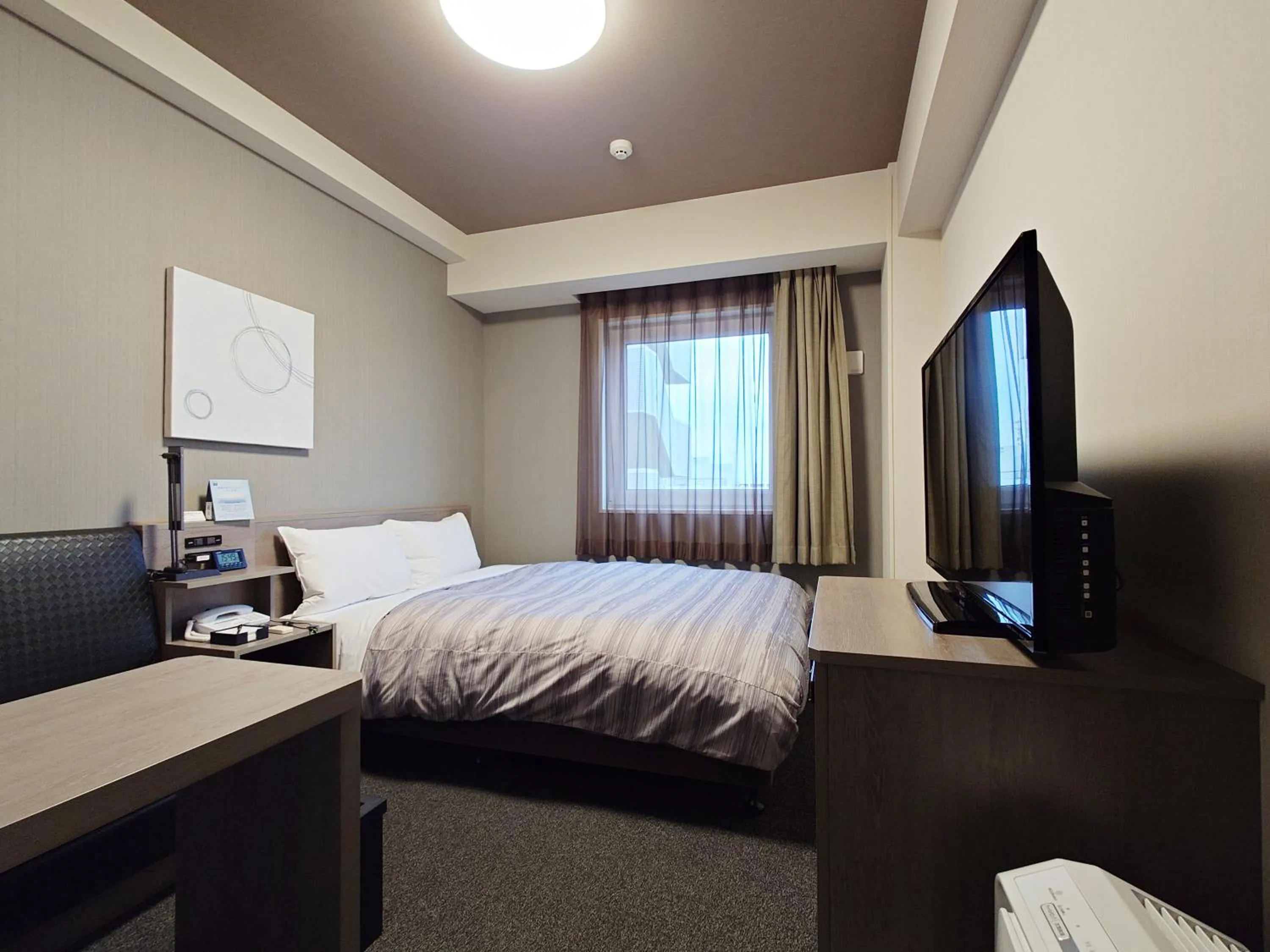 Photo of the whole room, Bed in Hotel Route-Inn Koga Ekimae