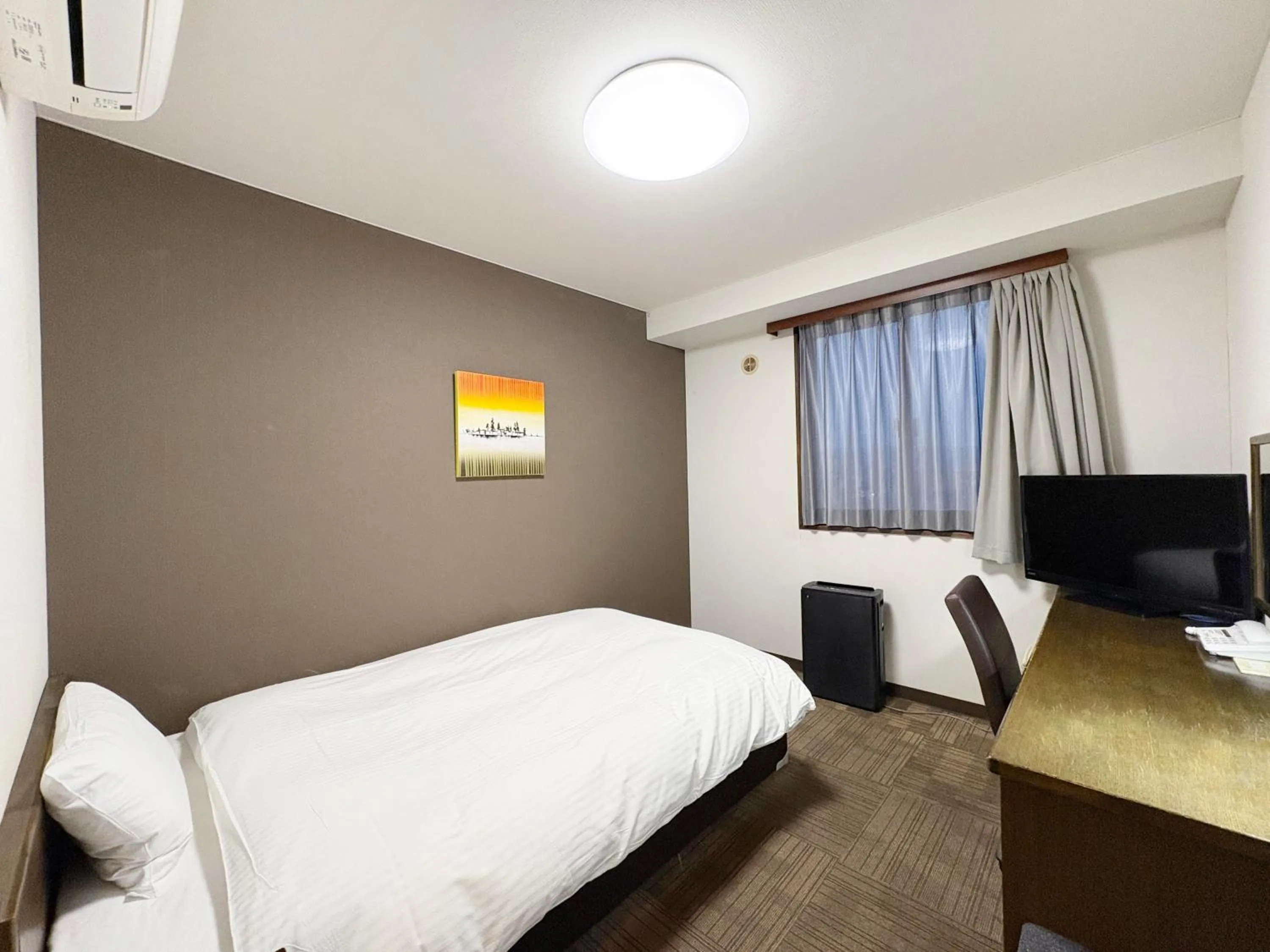 Photo of the whole room, Bed in Hotel Route-Inn Court Minami Alps