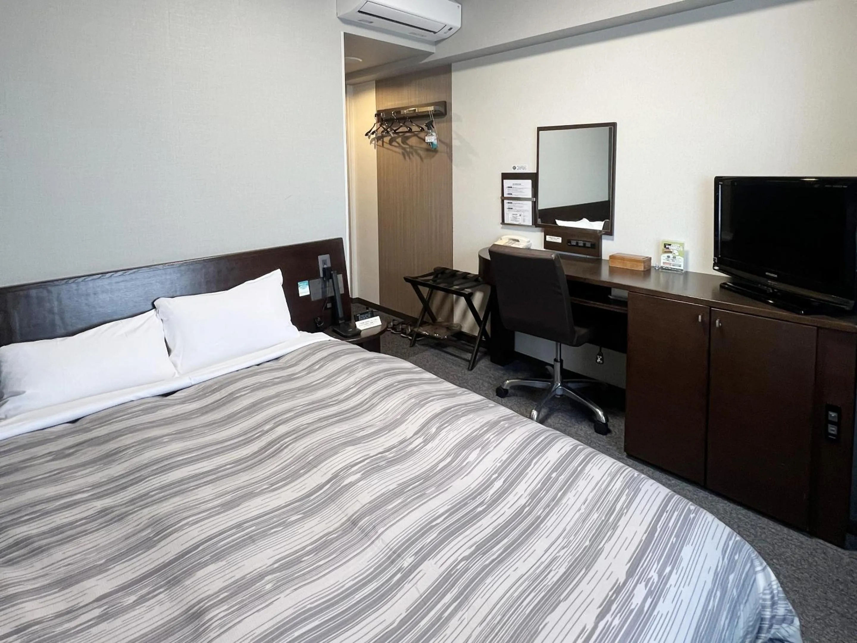 Photo of the whole room, Bed in Hotel Route-Inn Shimodate