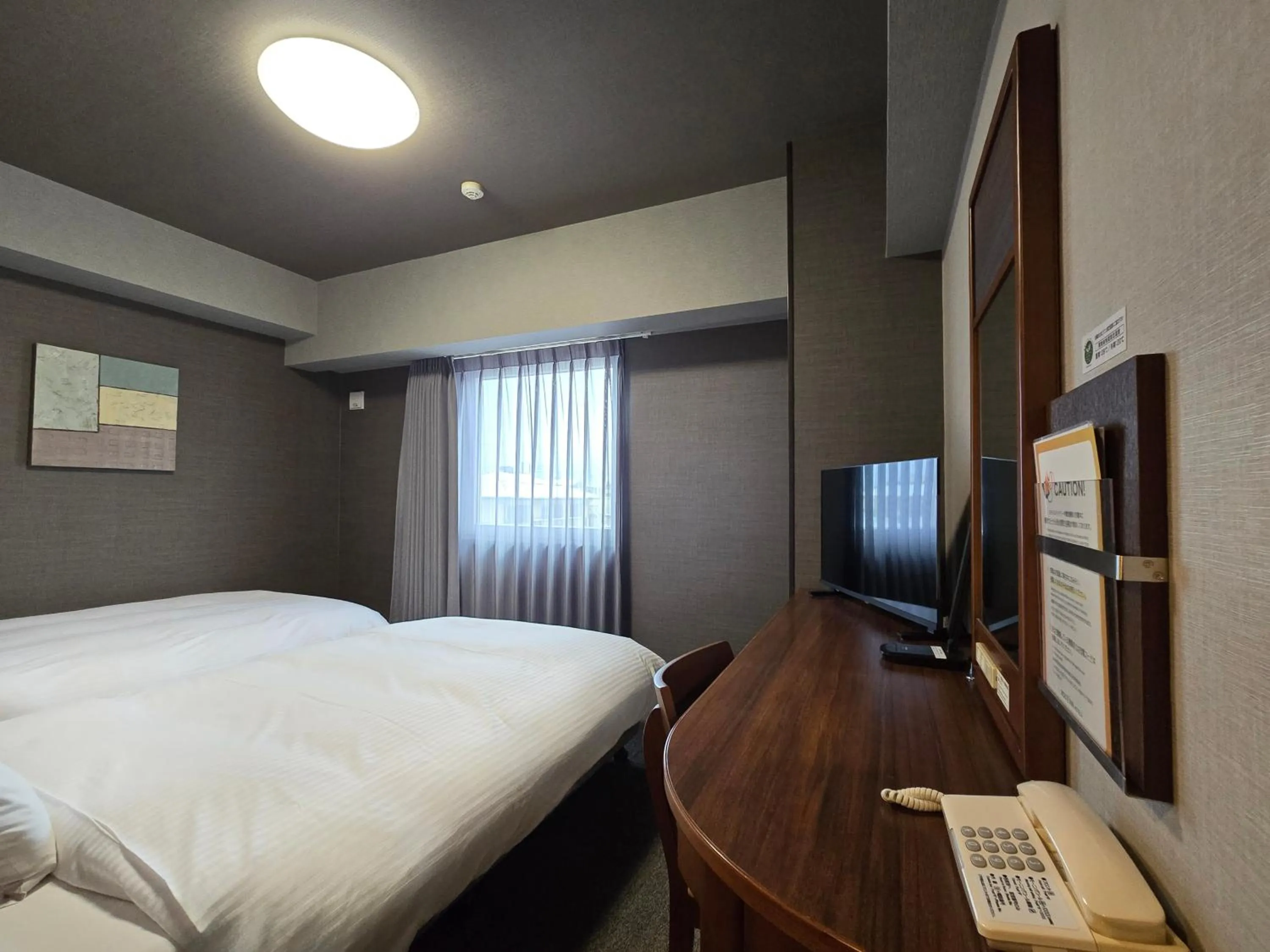 Photo of the whole room, Bed in Hotel Route-Inn Shimodate