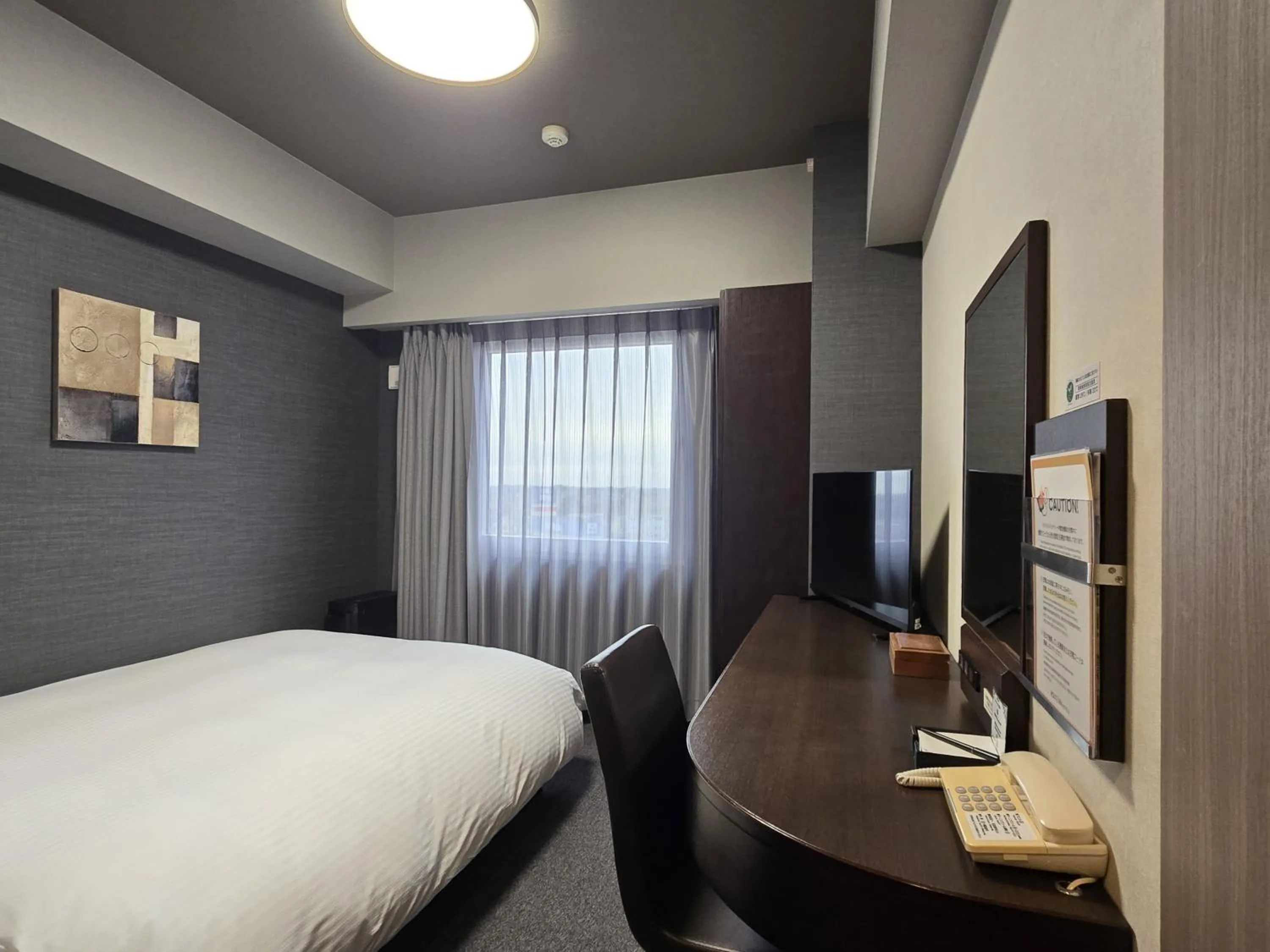 Photo of the whole room, Bed in Hotel Route-Inn Shimodate