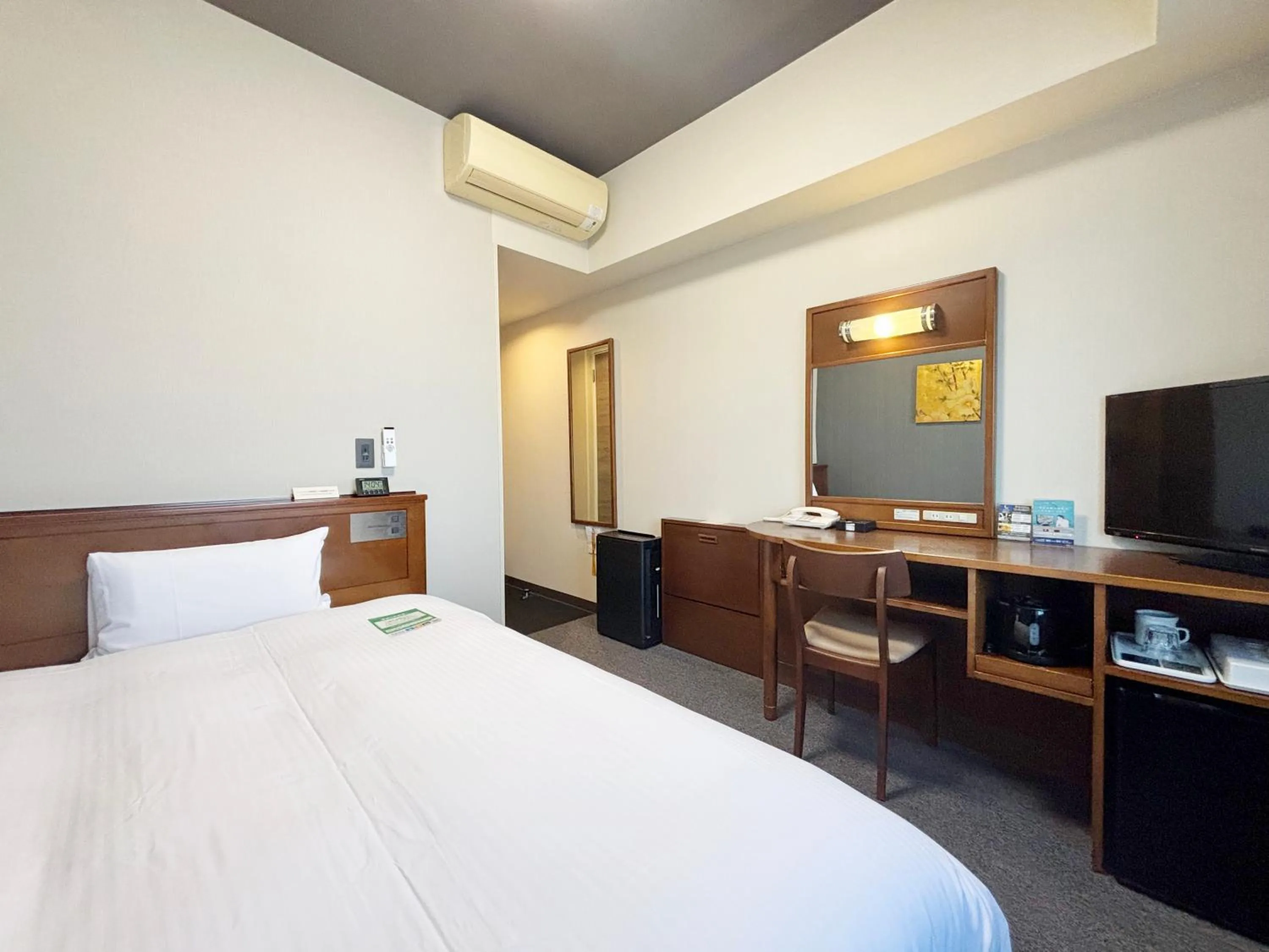 Photo of the whole room, Bed in Hotel Route-Inn Sendaiizumi Inter