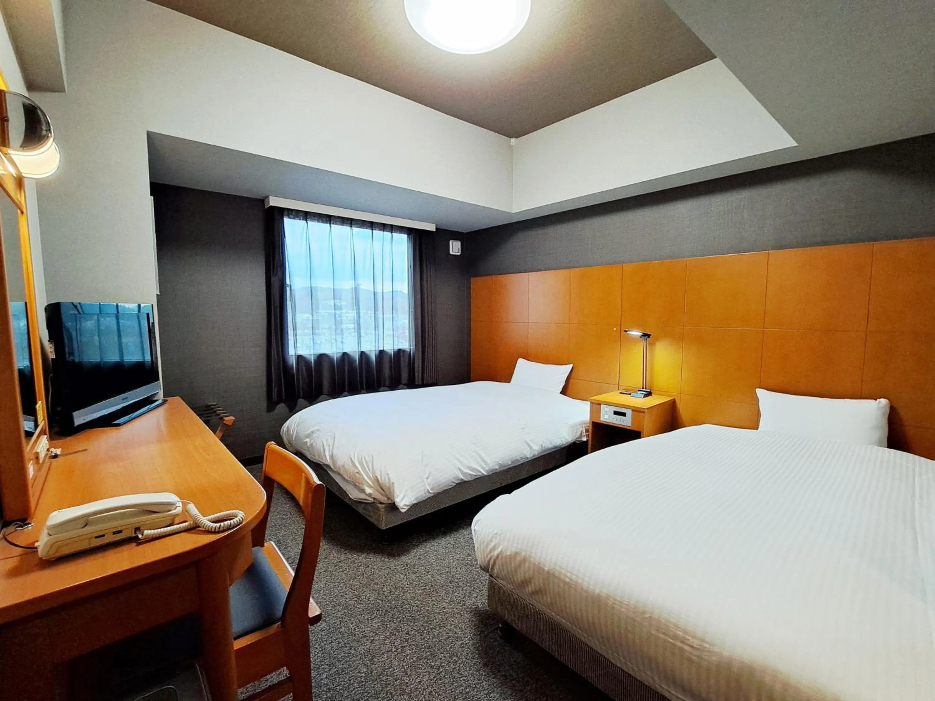 Photo of the whole room, Bed in Hotel Route-Inn Shinjyo Ekimae