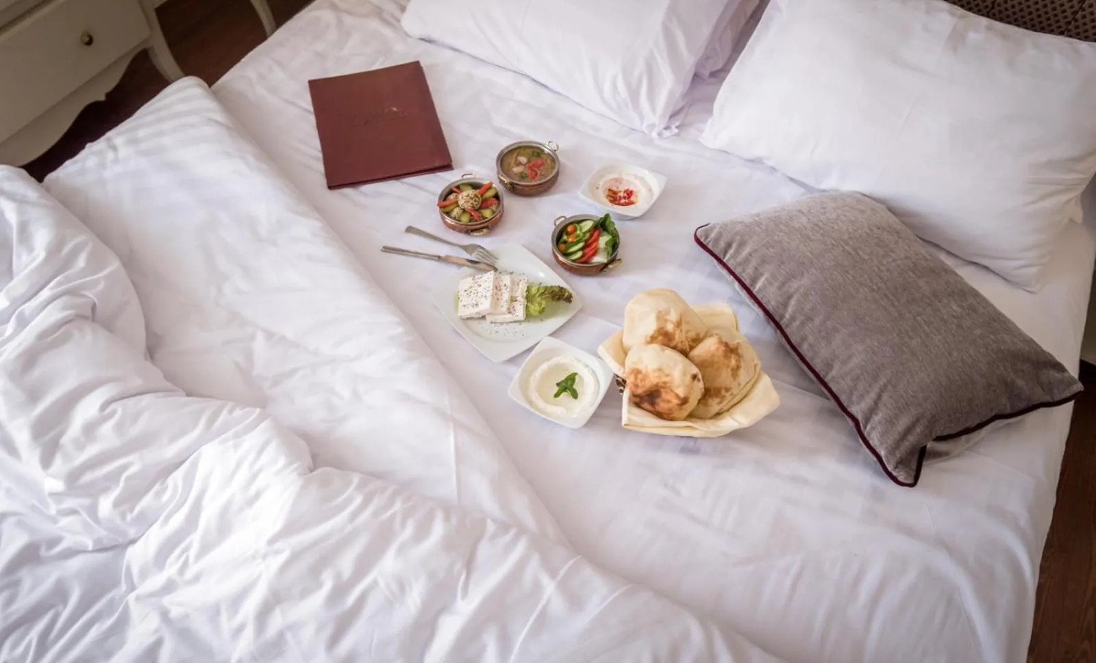 Bed in 1920s Boutique Hotel and Restaurants