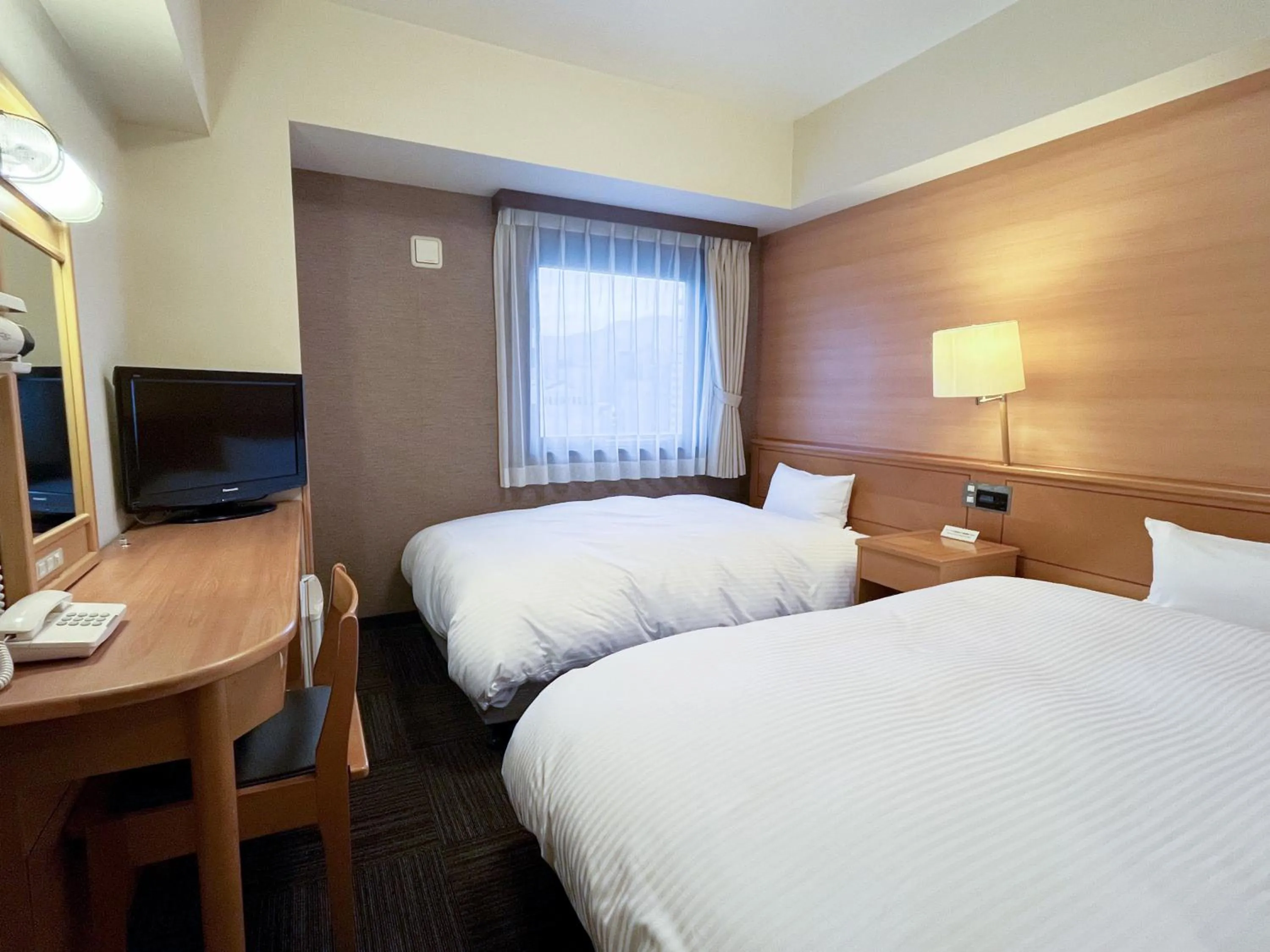 Photo of the whole room, Bed in Hotel Route-Inn Yamagata Ekimae