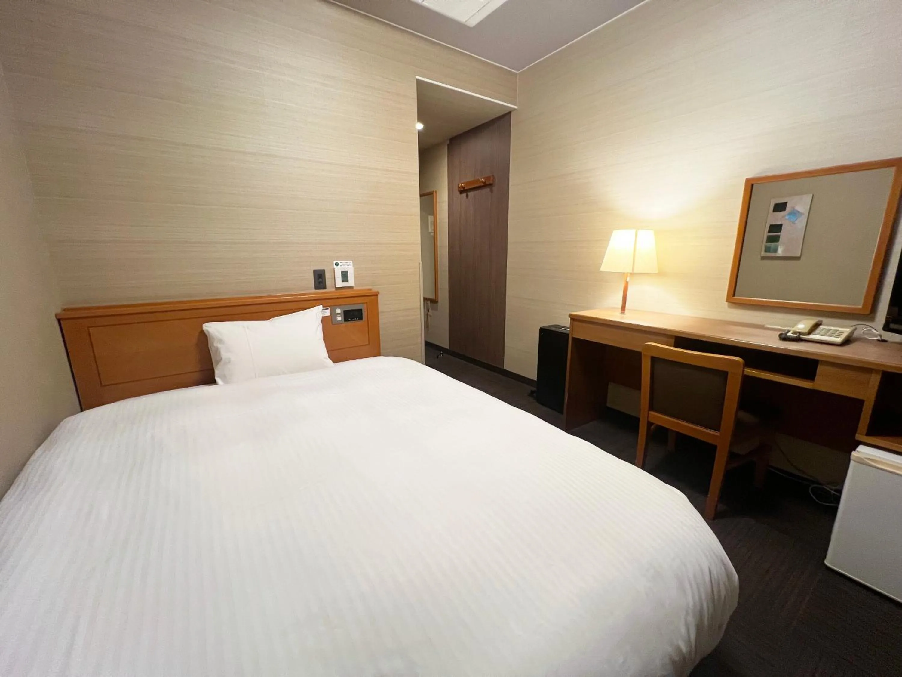 Photo of the whole room, Bed in Hotel Route-Inn Tsuruoka Inter