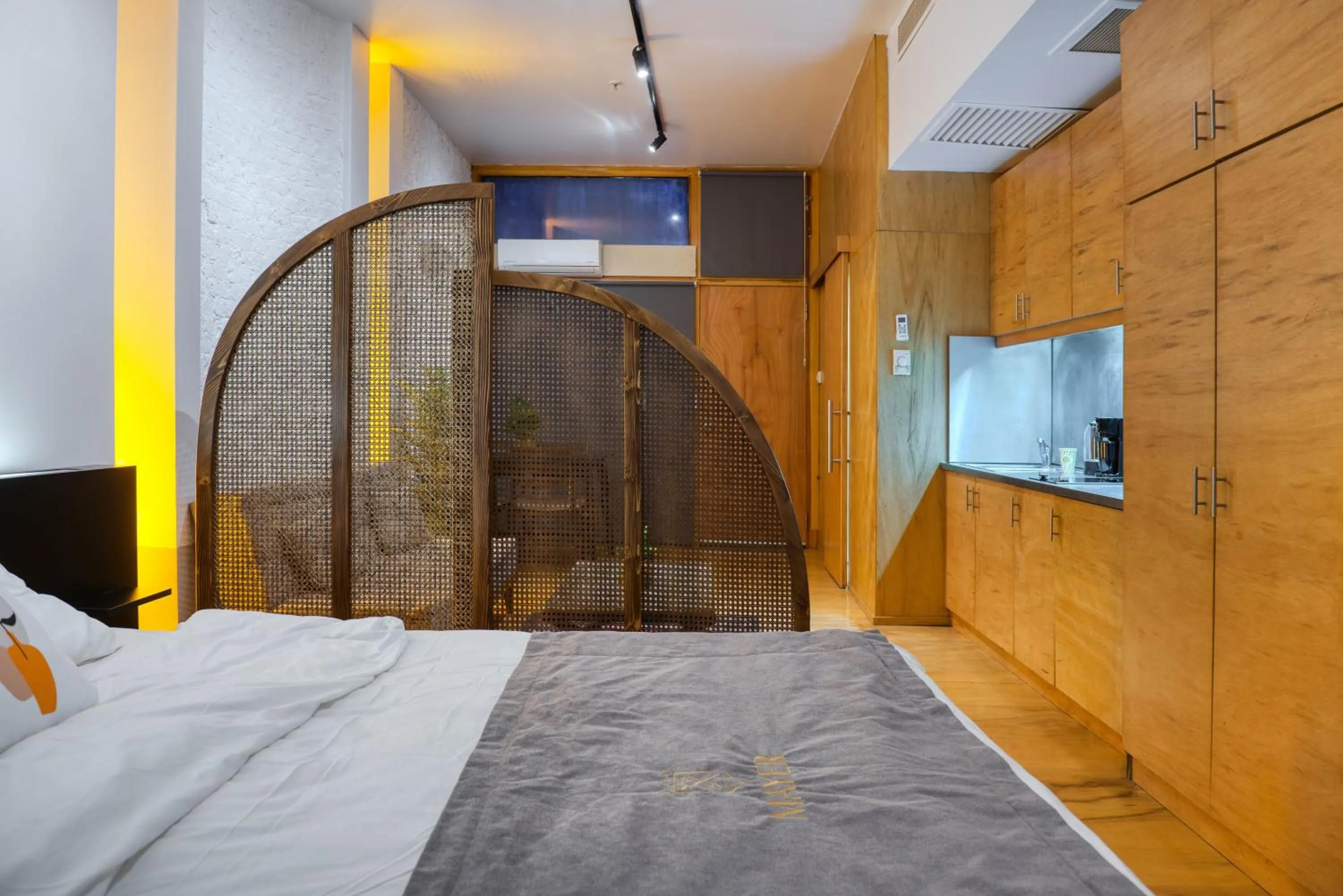 Bed in Mayer Loft Suites