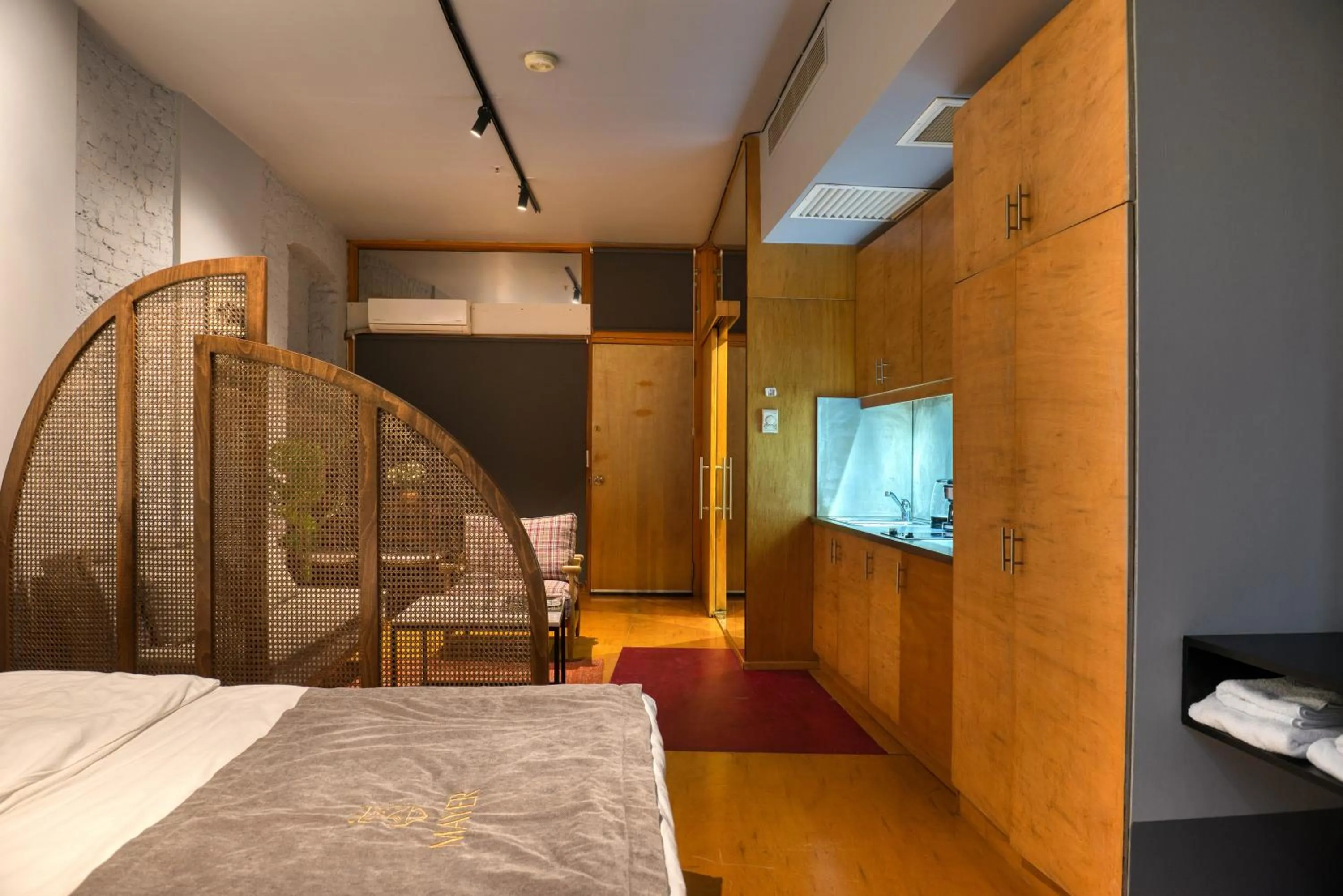 Bed in Mayer Loft Suites