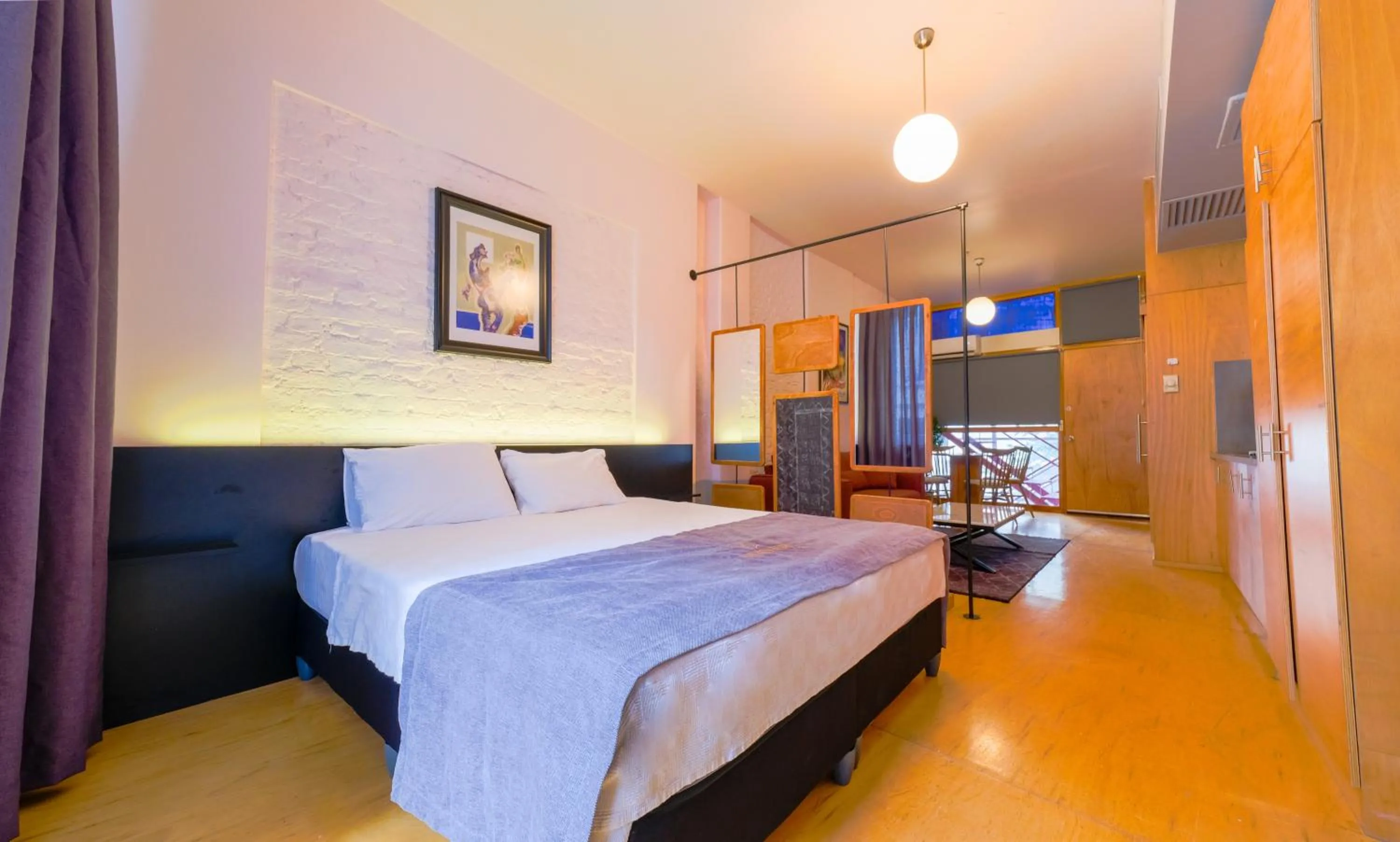 Bed in Mayer Loft Suites