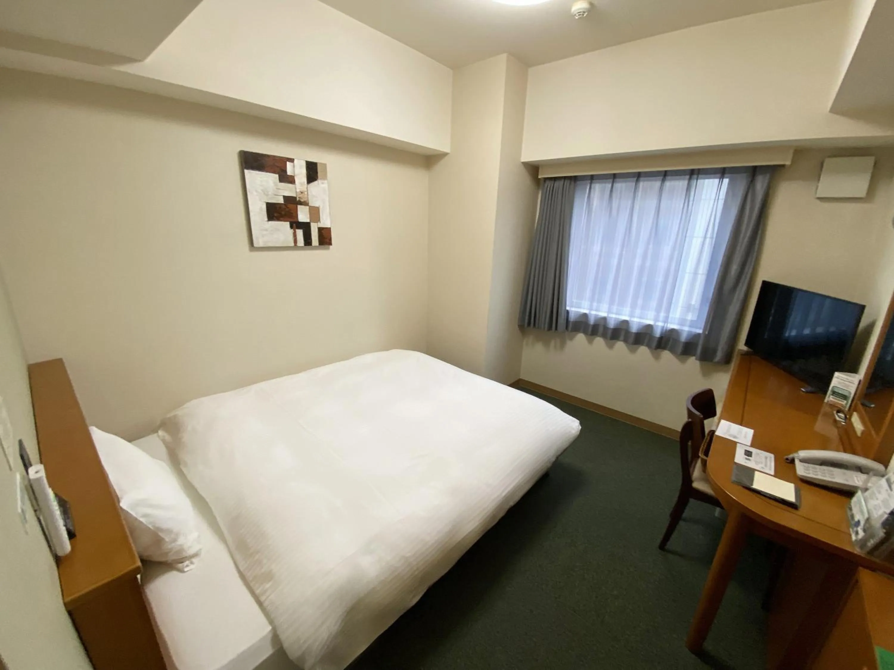 Photo of the whole room, Bed in Hotel Route-Inn Fukaya Ekimae