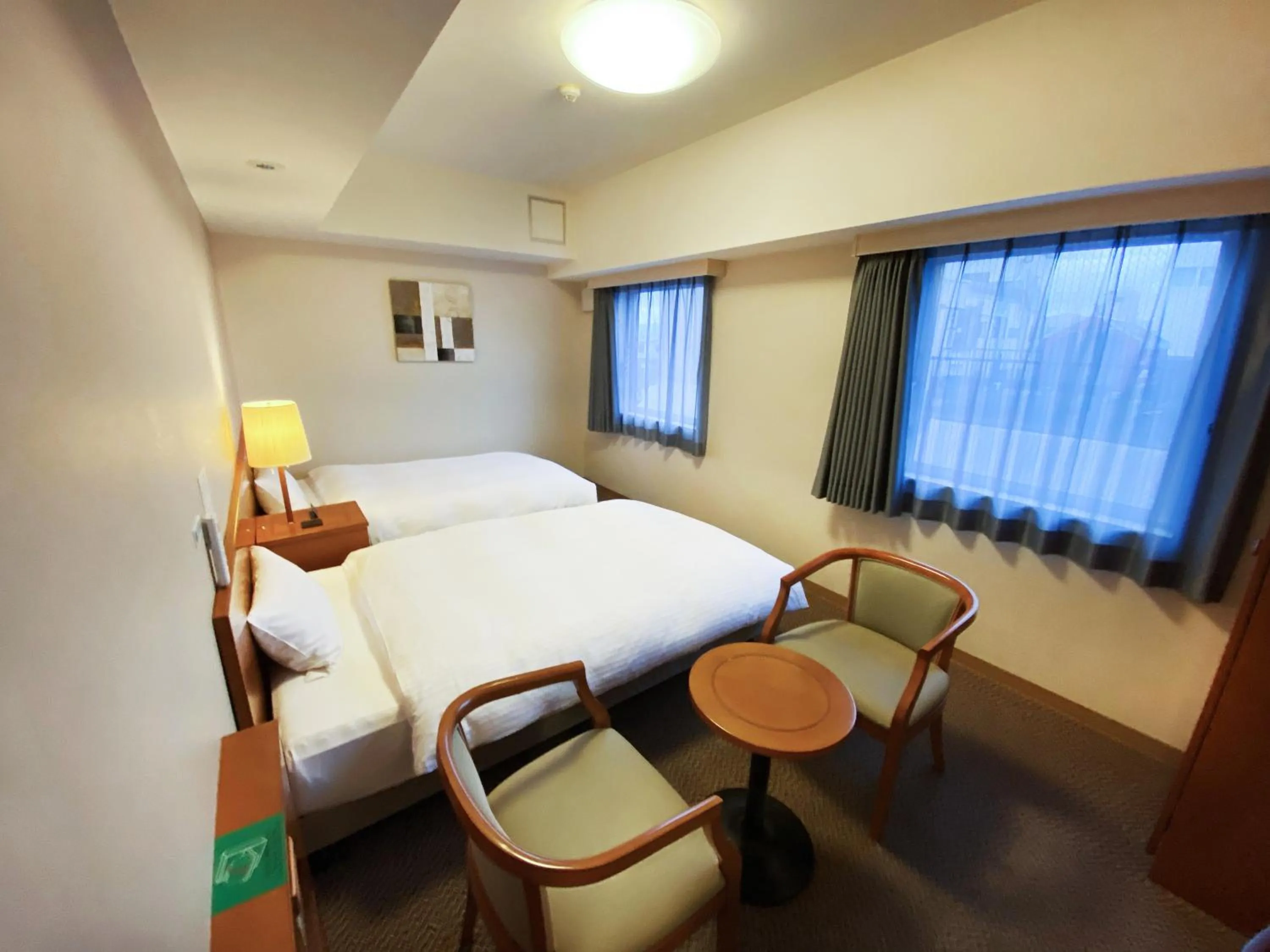 Photo of the whole room, Bed in Hotel Route-Inn Fukaya Ekimae