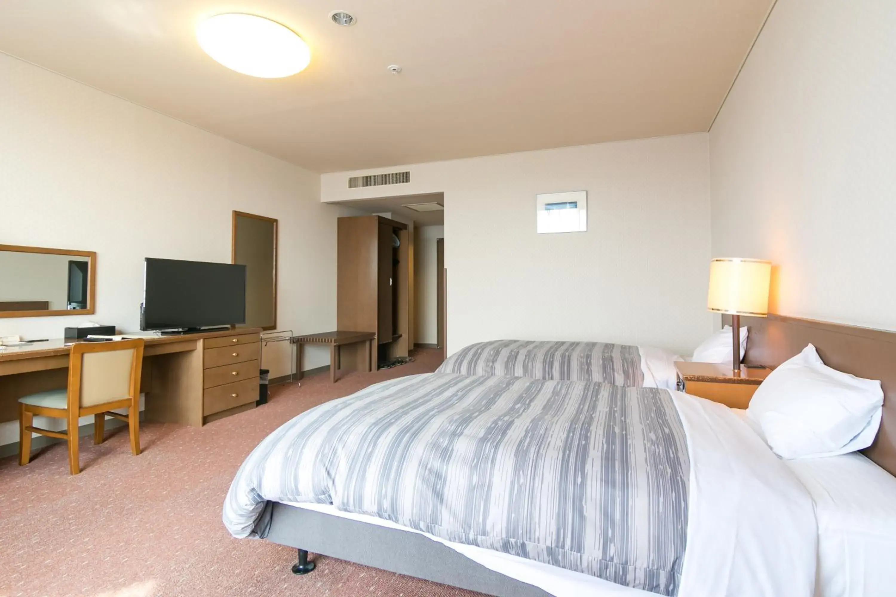 Photo of the whole room, Bed in Tokachi Makubetsu Onsen Grandvrio Hotel Photo of the whole room, Bed in Tokachi Makubetsu Onsen Grandvrio Hotel