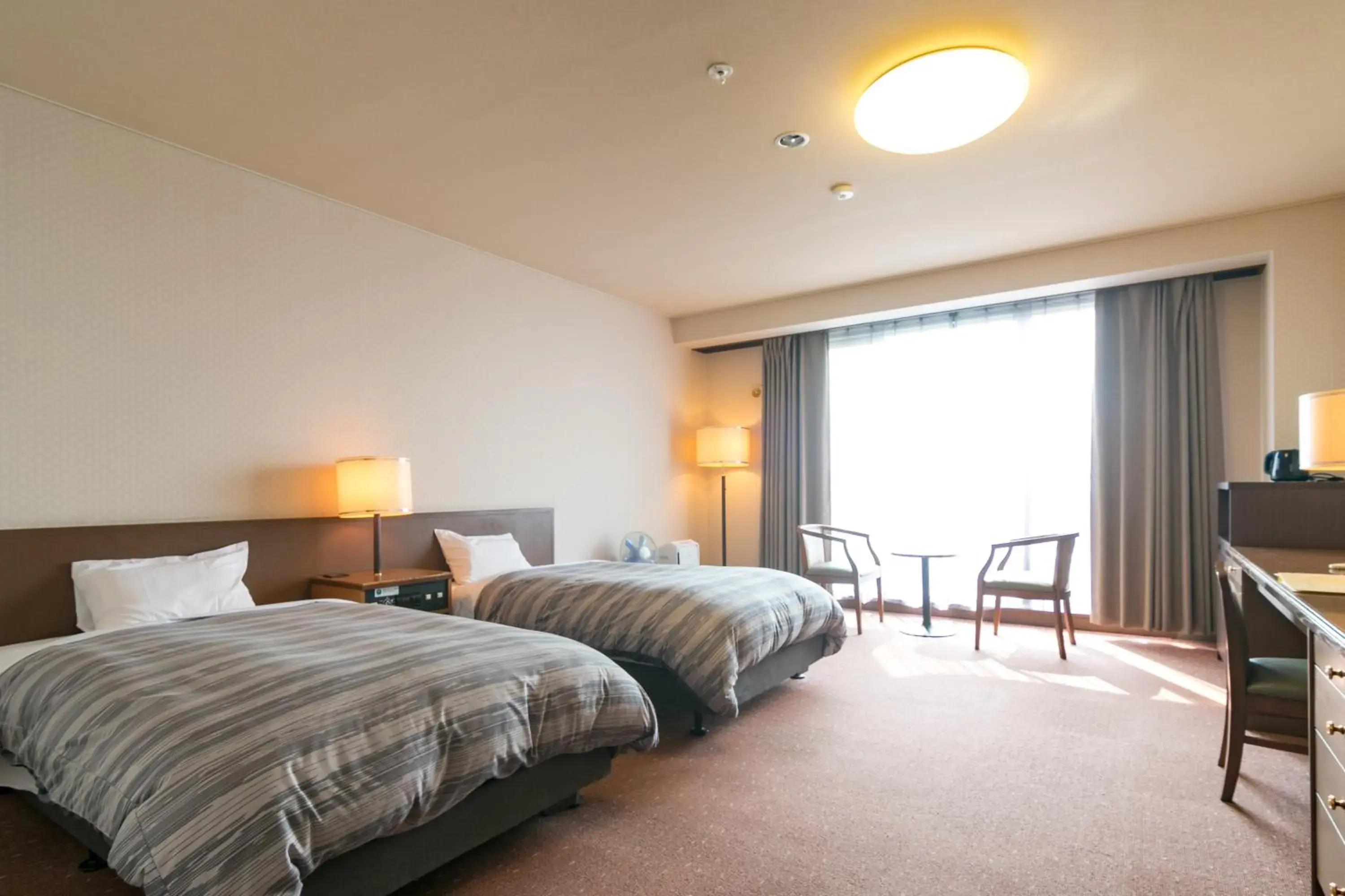 Photo of the whole room, Bed in Tokachi Makubetsu Onsen Grandvrio Hotel Photo of the whole room, Bed in Tokachi Makubetsu Onsen Grandvrio Hotel