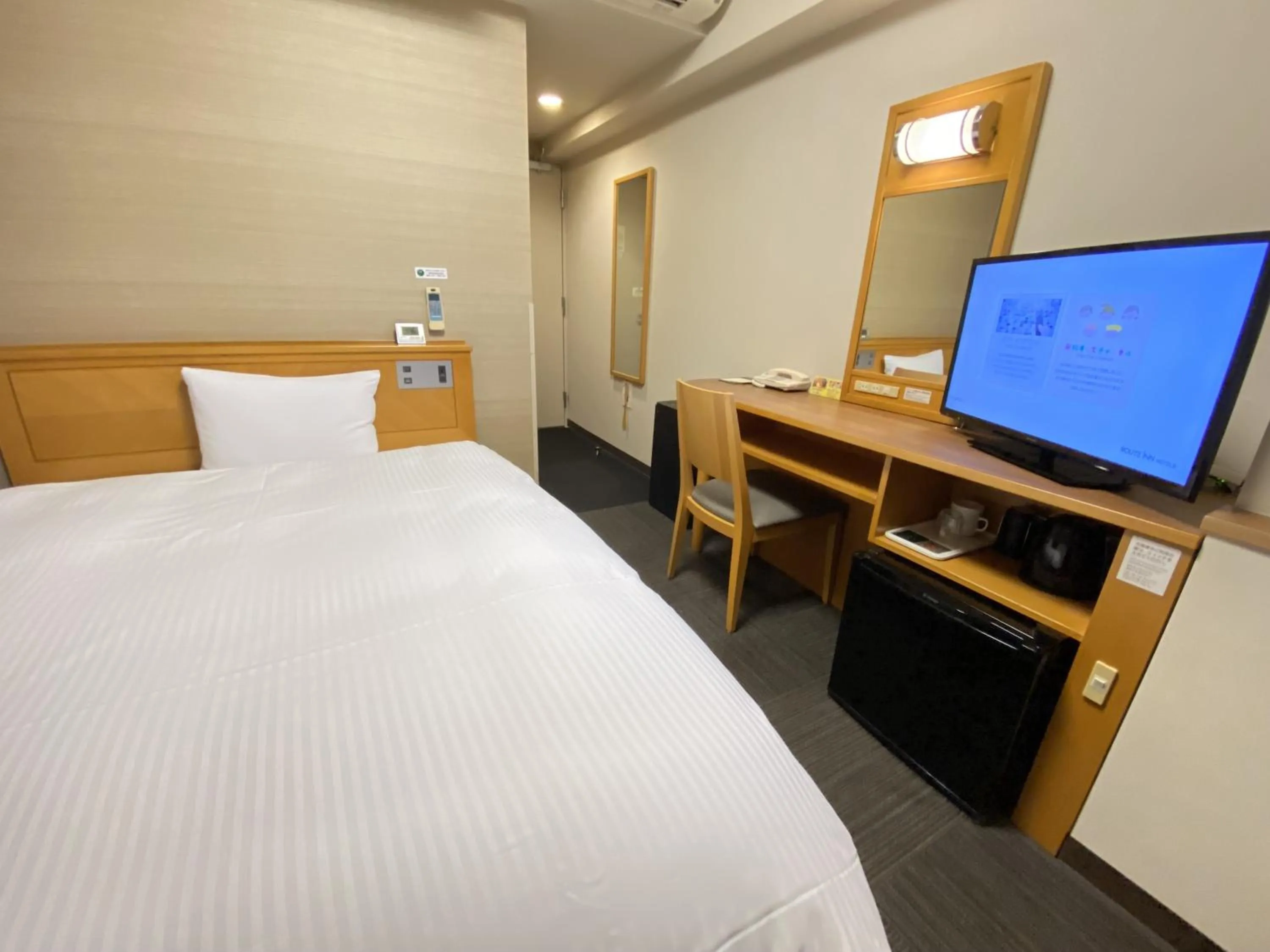 Bed in Hotel Route-Inn Hon Hachinohe Ekimae