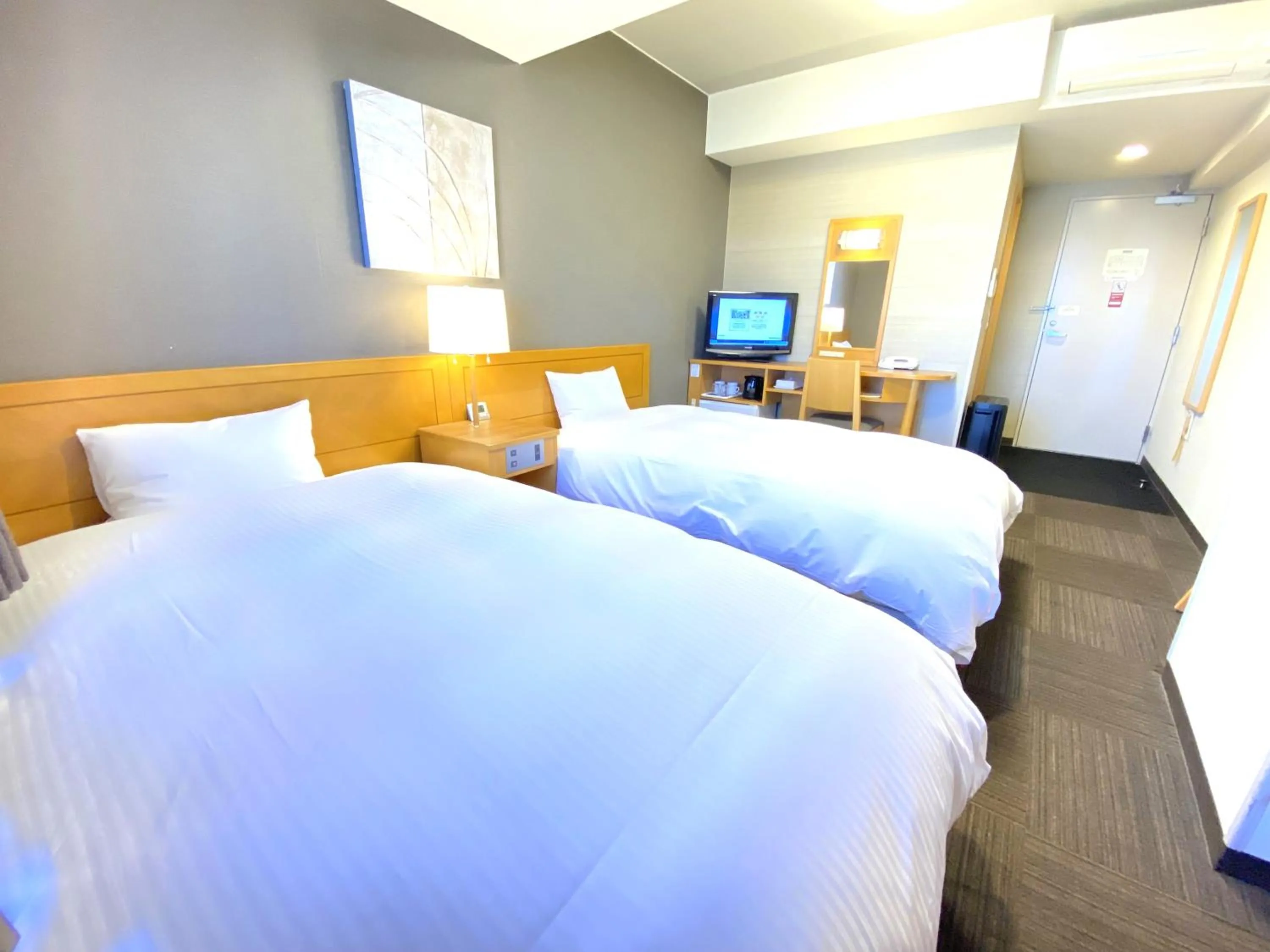 Bed in Hotel Route-Inn Hon Hachinohe Ekimae