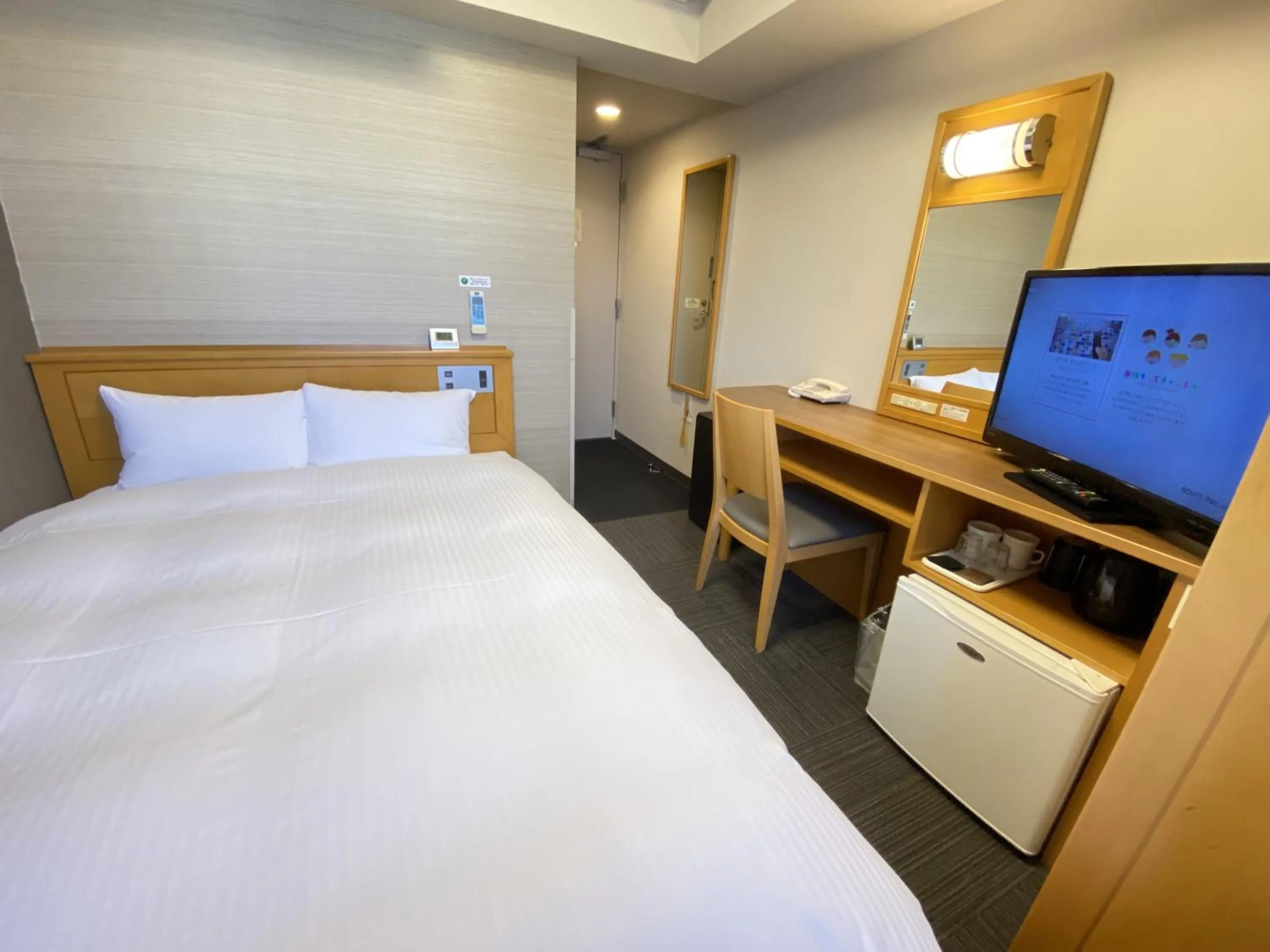 Bed in Hotel Route-Inn Hon Hachinohe Ekimae