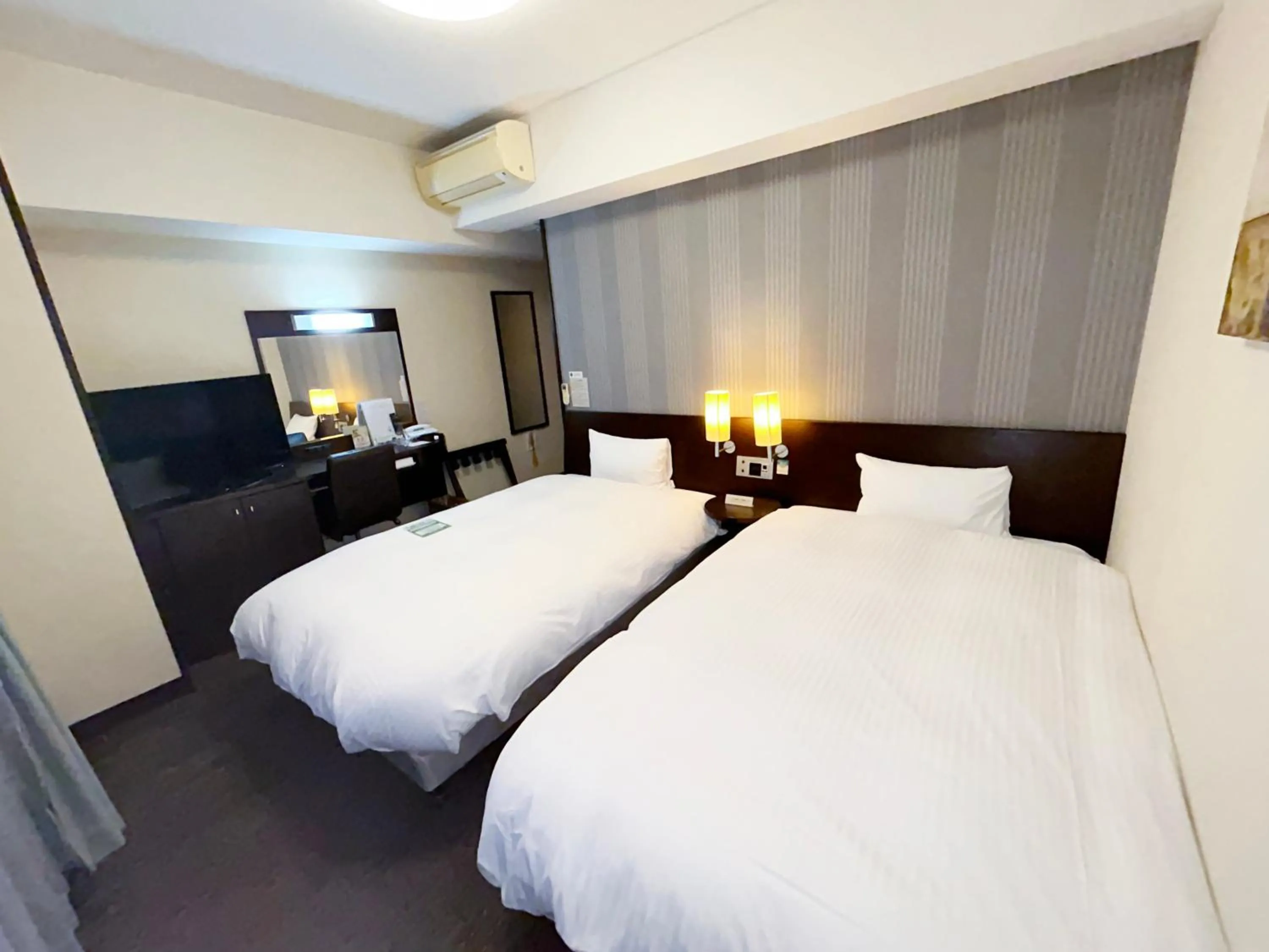 Photo of the whole room, Bed in Hotel Route-Inn Tosu Ekimae