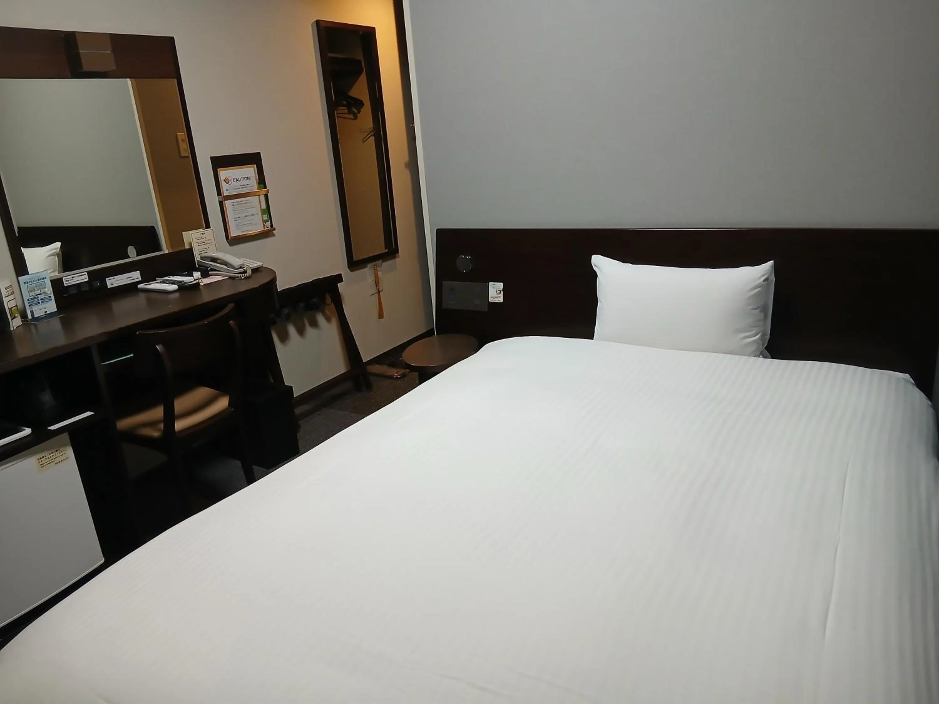 Bed in Hotel Route-Inn Saga Ekimae