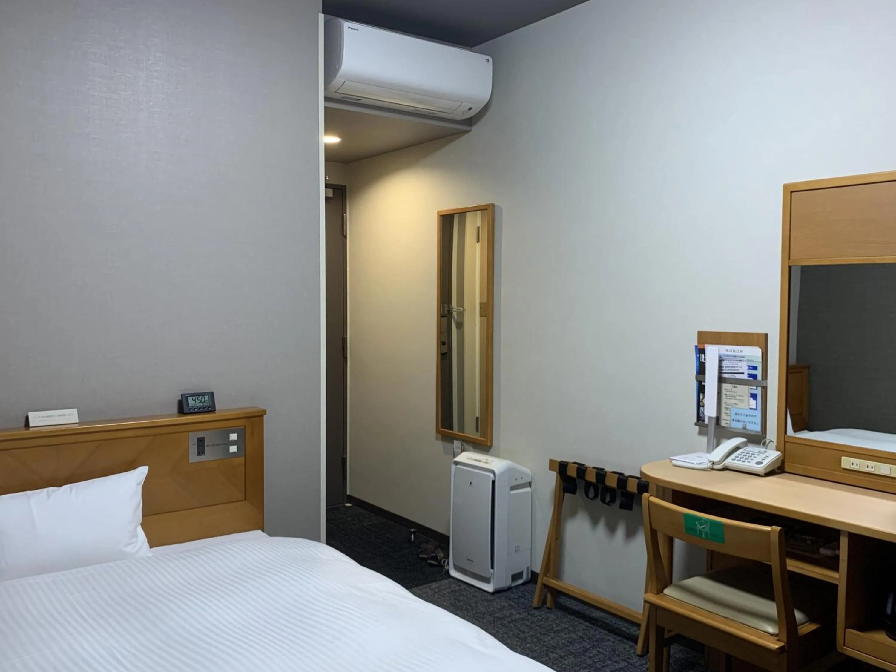 Photo of the whole room, Bed in Hotel Route-Inn Nakatsu Ekimae