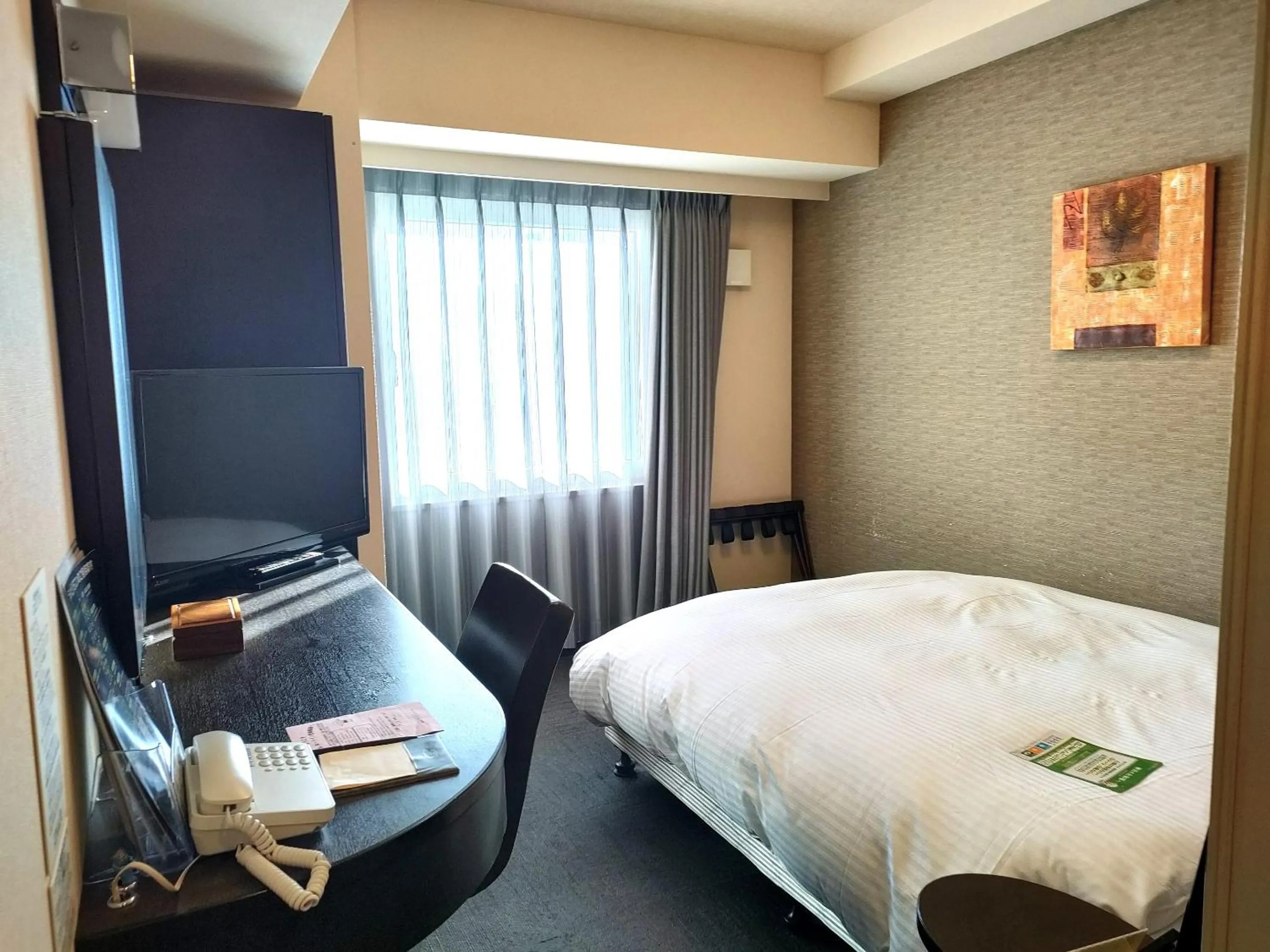 Photo of the whole room, Bed in Hotel Route-Inn Miyazaki Tachibana Dori