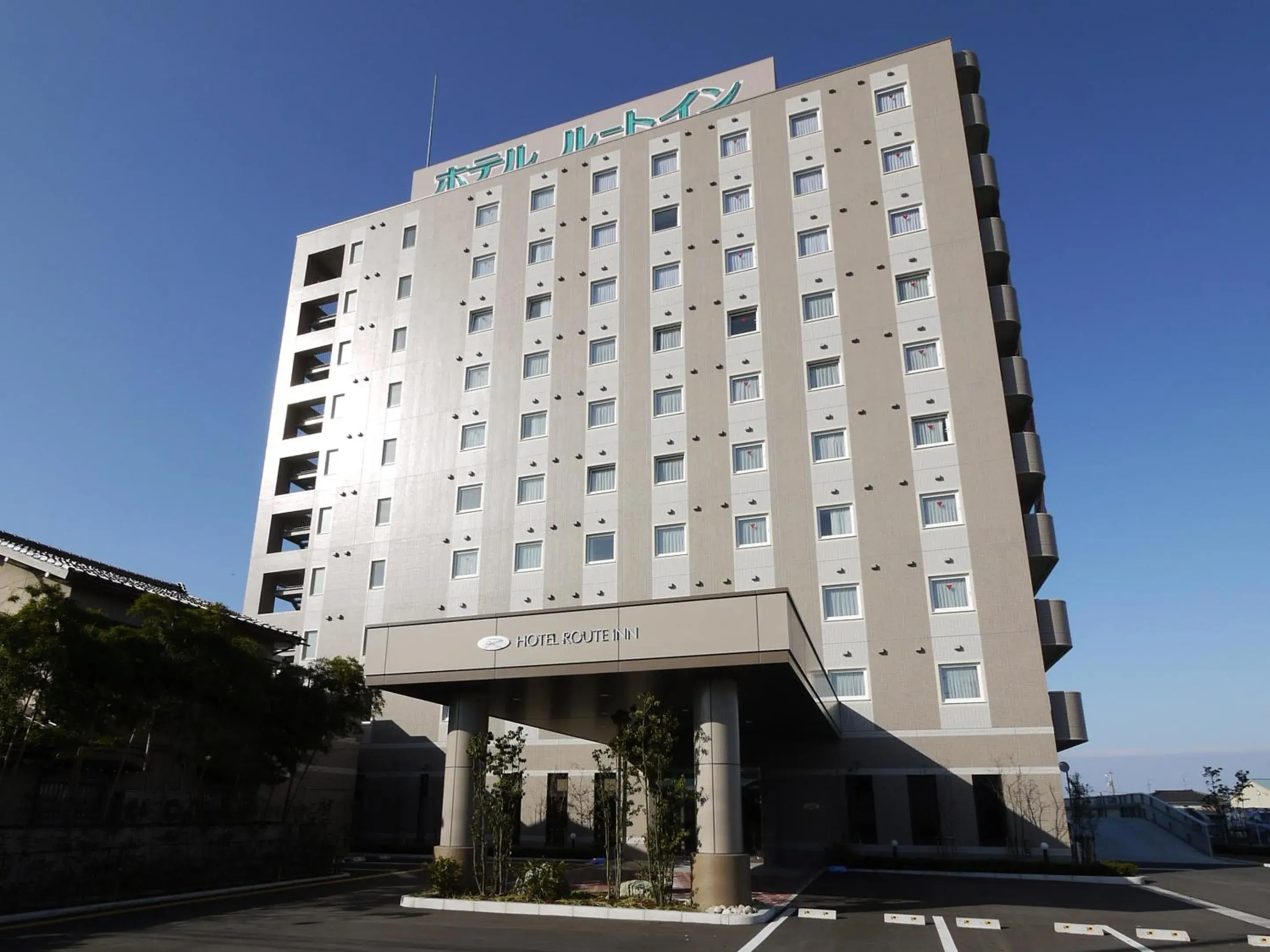 Property building in Hotel Route-Inn Uozu Property building in Hotel Route-Inn Uozu
