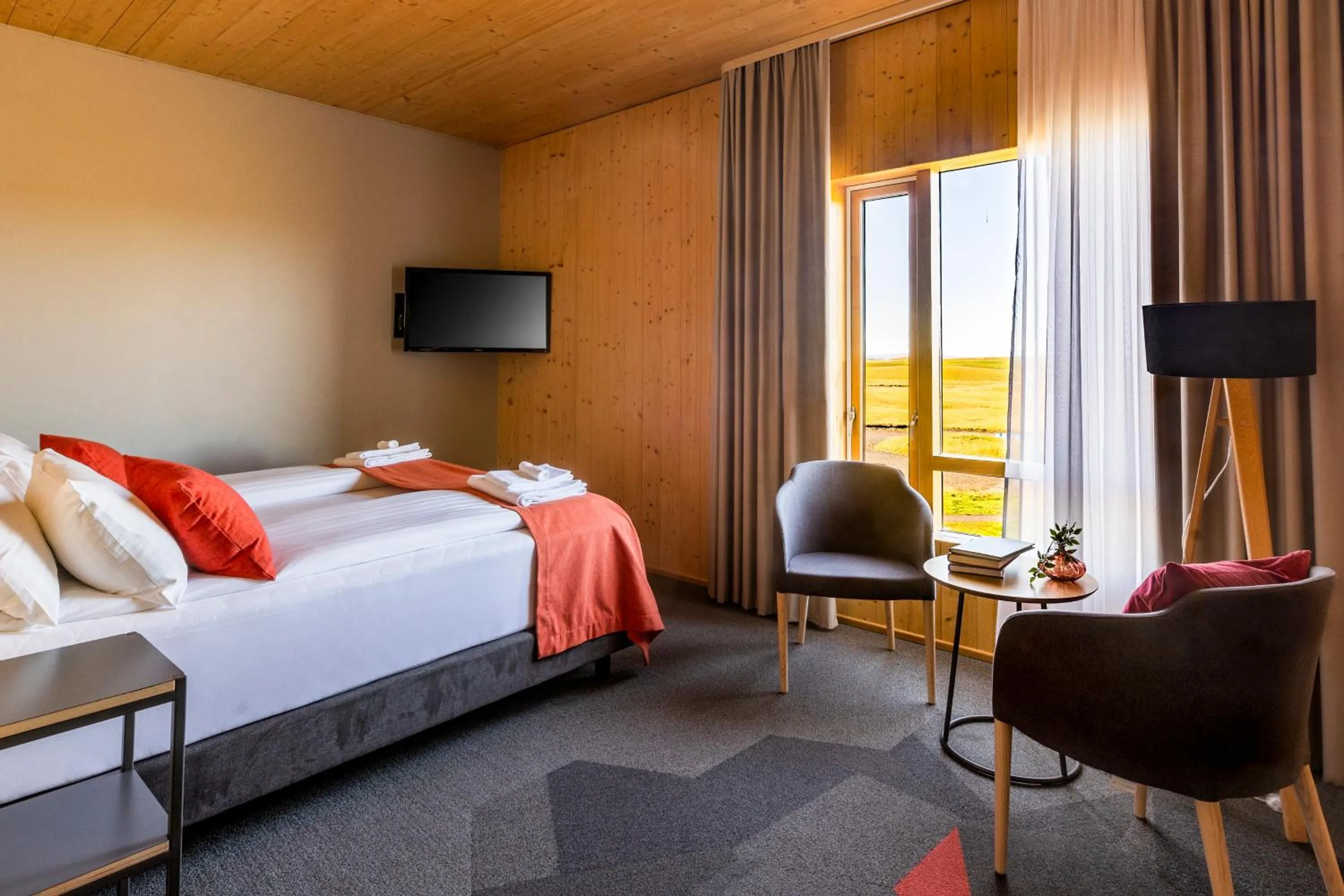 Seating area, Bed in Landhotel